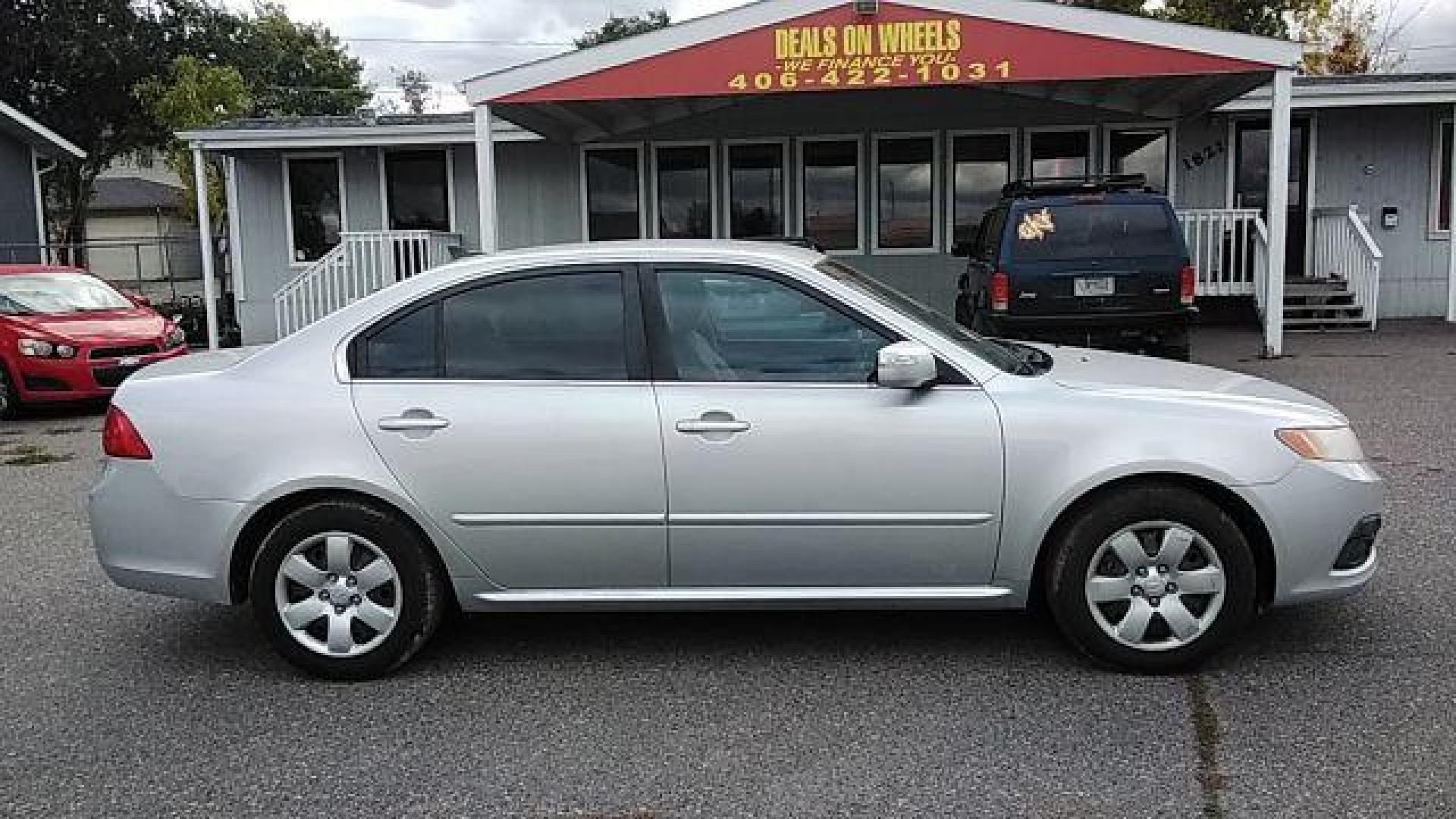 2009 Kia Optima LX (KNAGE228395) with an 2.4L L4 DOHC 16V engine, 4-Speed Automatic transmission, located at 1800 West Broadway, Missoula, 59808, (406) 543-1986, 46.881348, -114.023628 - Looking for a reliable and affordable pre-owned vehicle in Helena, MT? Look no further than this 2009 Kia Optima LX available at DOW - Helena. With a price tag of $13,995, this sedan offers great value for your money. The 2009 Kia Optima LX is powered by a 2.4L L4 DOHC 16V engine, paired with a 4- - Photo#3