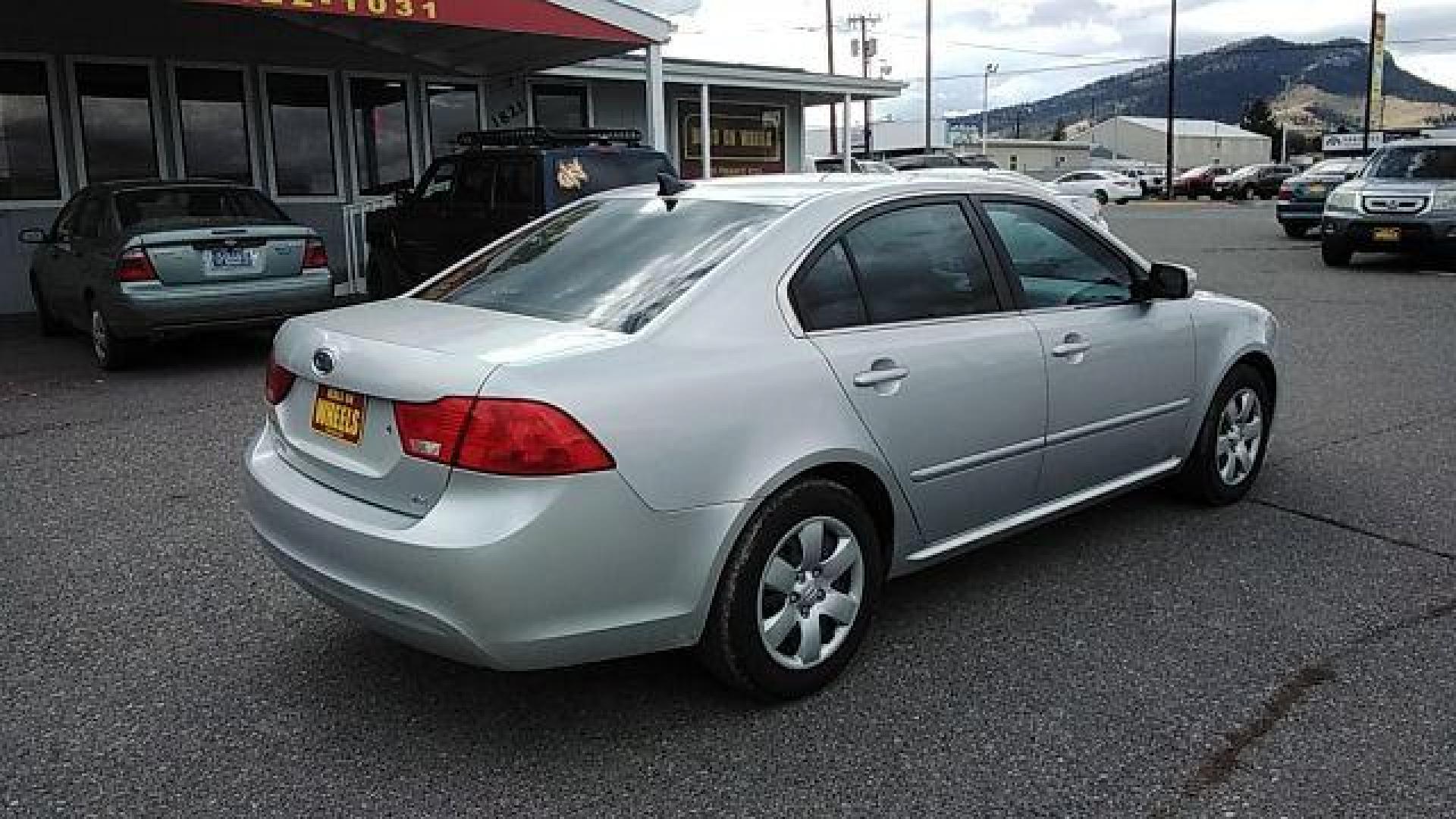 2009 Kia Optima LX (KNAGE228395) with an 2.4L L4 DOHC 16V engine, 4-Speed Automatic transmission, located at 1800 West Broadway, Missoula, 59808, (406) 543-1986, 46.881348, -114.023628 - Looking for a reliable and affordable pre-owned vehicle in Helena, MT? Look no further than this 2009 Kia Optima LX available at DOW - Helena. With a price tag of $13,995, this sedan offers great value for your money. The 2009 Kia Optima LX is powered by a 2.4L L4 DOHC 16V engine, paired with a 4- - Photo#4