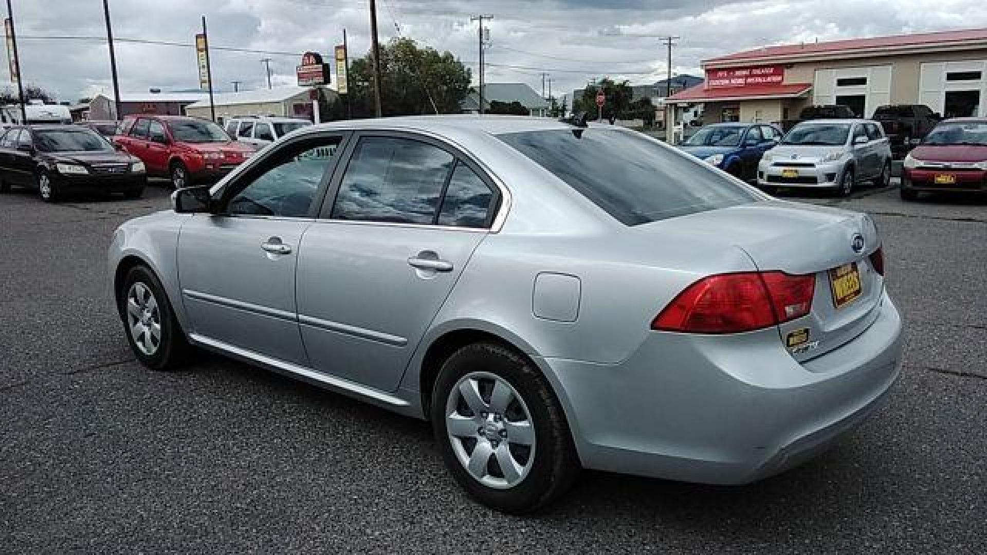 2009 Kia Optima LX (KNAGE228395) with an 2.4L L4 DOHC 16V engine, 4-Speed Automatic transmission, located at 1800 West Broadway, Missoula, 59808, (406) 543-1986, 46.881348, -114.023628 - Looking for a reliable and affordable pre-owned vehicle in Helena, MT? Look no further than this 2009 Kia Optima LX available at DOW - Helena. With a price tag of $13,995, this sedan offers great value for your money. The 2009 Kia Optima LX is powered by a 2.4L L4 DOHC 16V engine, paired with a 4- - Photo#6