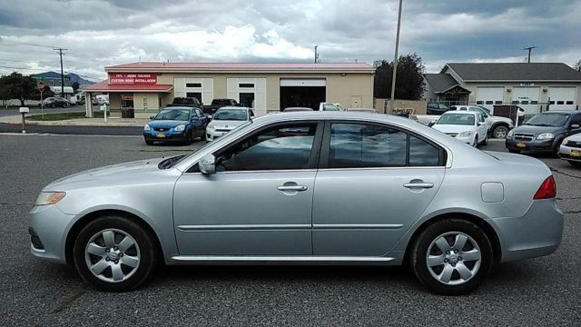 2009 Kia Optima LX (KNAGE228395) with an 2.4L L4 DOHC 16V engine, 4-Speed Automatic transmission, located at 1800 West Broadway, Missoula, 59808, (406) 543-1986, 46.881348, -114.023628 - Looking for a reliable and affordable pre-owned vehicle in Helena, MT? Look no further than this 2009 Kia Optima LX available at DOW - Helena. With a price tag of $13,995, this sedan offers great value for your money. The 2009 Kia Optima LX is powered by a 2.4L L4 DOHC 16V engine, paired with a 4- - Photo#7