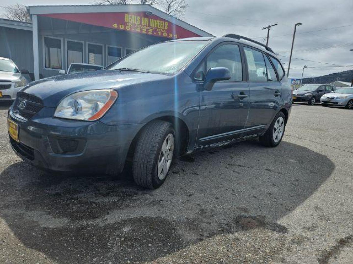 2009 Kia Rondo LX (KNAFG529097) with an 2.4L L4 DOHC 16V engine, 4-Speed Automatic transmission, located at 1821 N Montana Ave., Helena, MT, 59601, 46.603447, -112.022781 - Photo#0