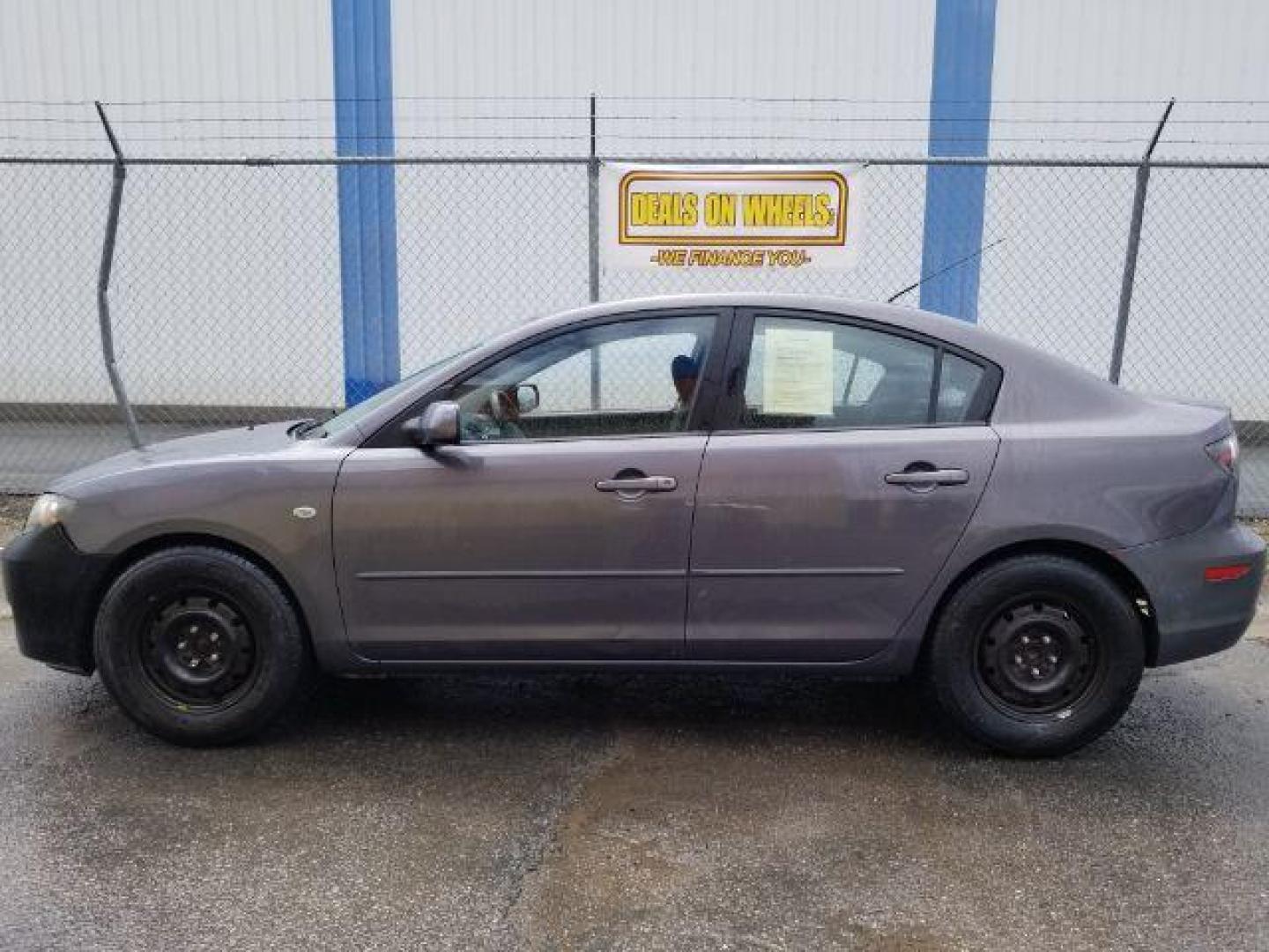 2009 GRAY MAZDA MAZDA3 i Sport 4-Door (JM1BK32G491) , located at 1800 West Broadway, Missoula, 59808, (406) 543-1986, 46.881348, -114.023628 - Photo#2