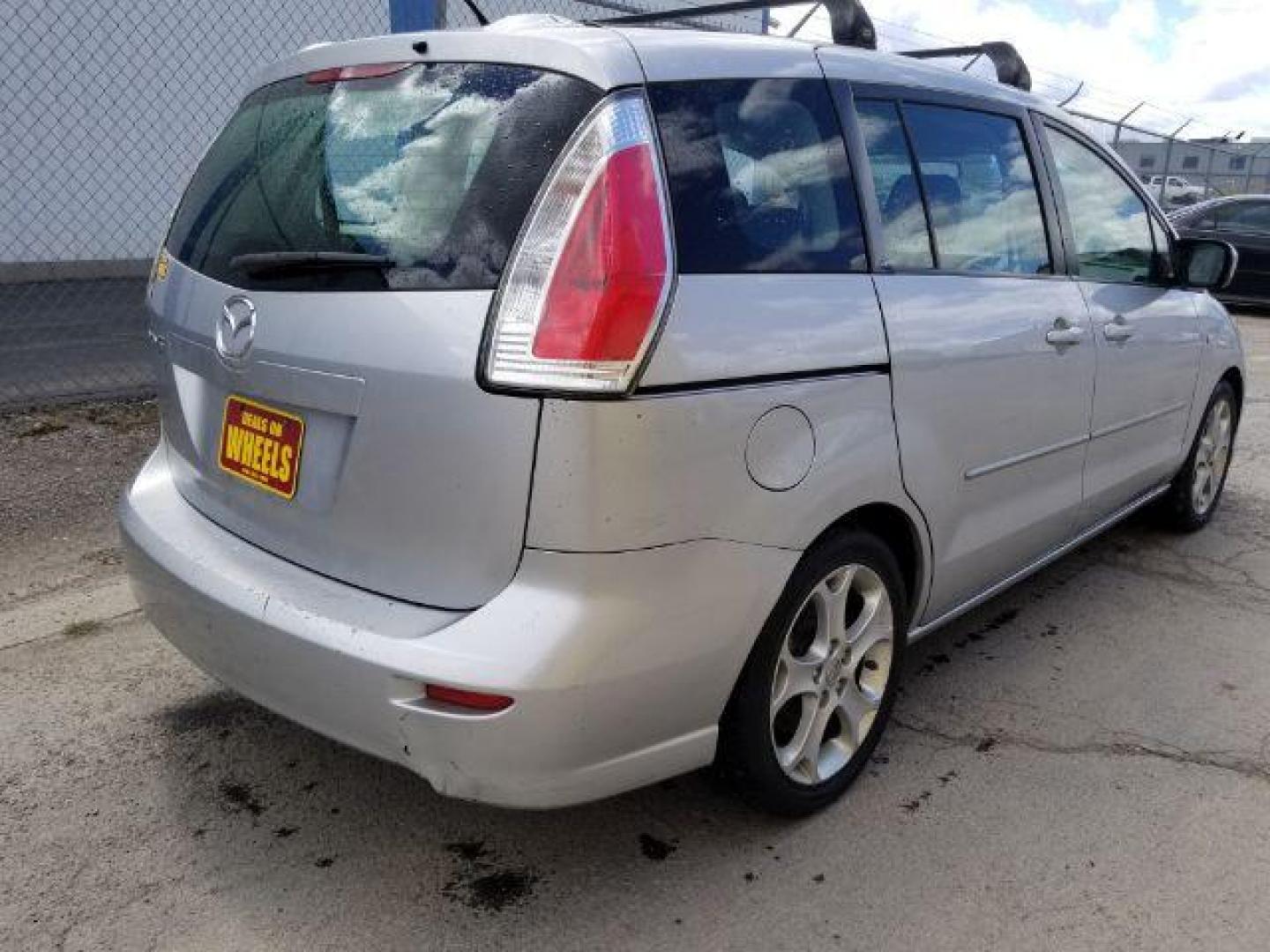 2009 Mazda MAZDA5 Grand Touring (JM1CR29L790) with an 2.3L L4 DOHC 16V engine, located at 4801 10th Ave S,, Great Falls, MT, 59405, 47.494347, -111.229942 - Photo#4