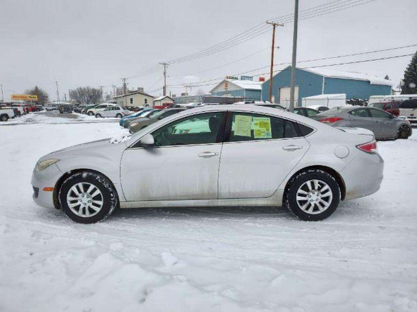 2009 Brilliant Silver Metallic Mazda Mazda6 i SV (1YVHP80A395) with an 2.5L L4 DOHC 16V engine, located at 4801 10th Ave S,, Great Falls, MT, 59405, 47.494347, -111.229942 - Photo#1