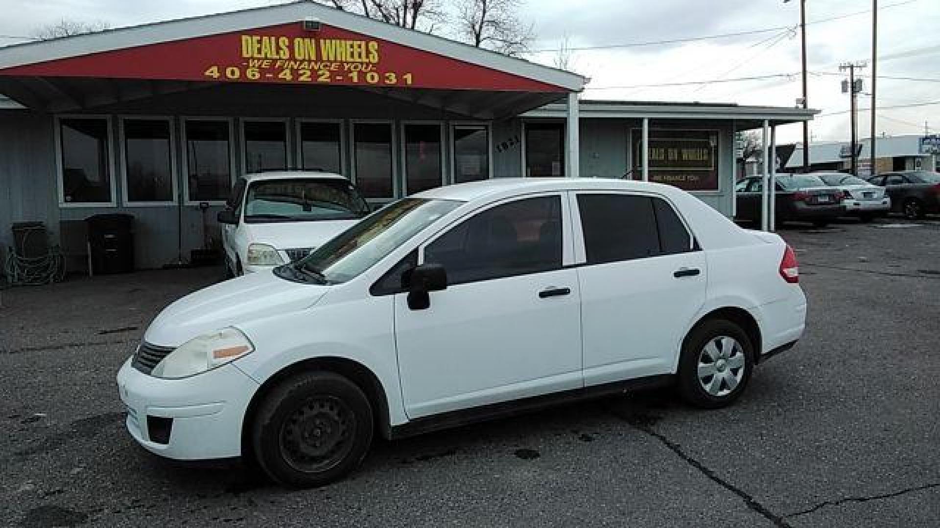 2009 Fresh Powder Nissan Versa 1.6 Base Sedan (3N1CC11E29L) with an 1.6L L4 DOHC 16V engine, located at 1821 N Montana Ave., Helena, MT, 59601, 46.603447, -112.022781 - Photo#0