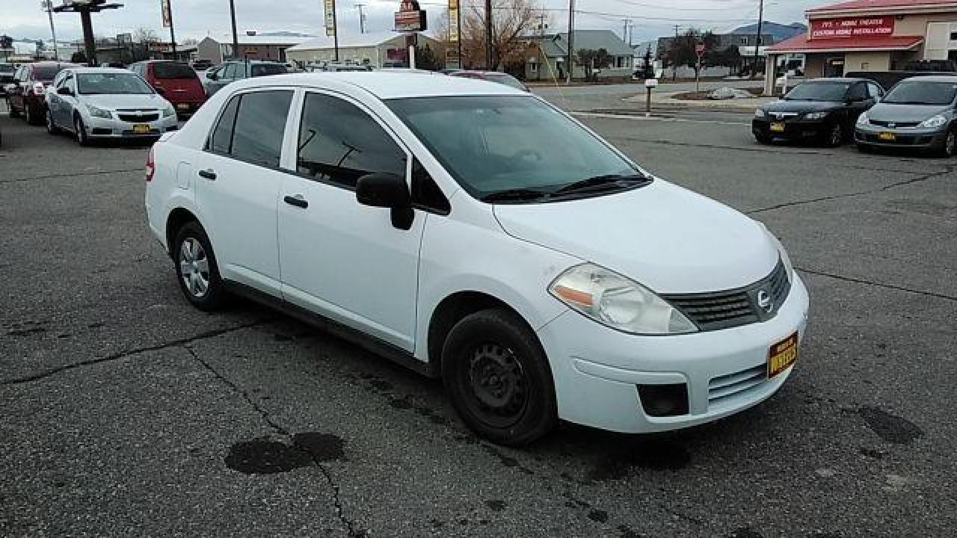 2009 Fresh Powder Nissan Versa 1.6 Base Sedan (3N1CC11E29L) with an 1.6L L4 DOHC 16V engine, located at 1821 N Montana Ave., Helena, MT, 59601, 46.603447, -112.022781 - Photo#2