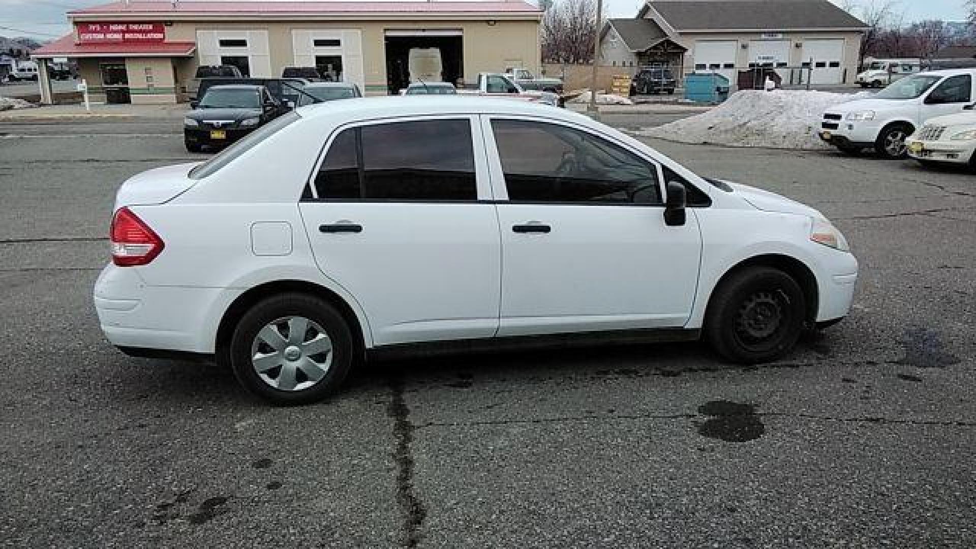 2009 Fresh Powder Nissan Versa 1.6 Base Sedan (3N1CC11E29L) with an 1.6L L4 DOHC 16V engine, located at 1821 N Montana Ave., Helena, MT, 59601, 46.603447, -112.022781 - Photo#3