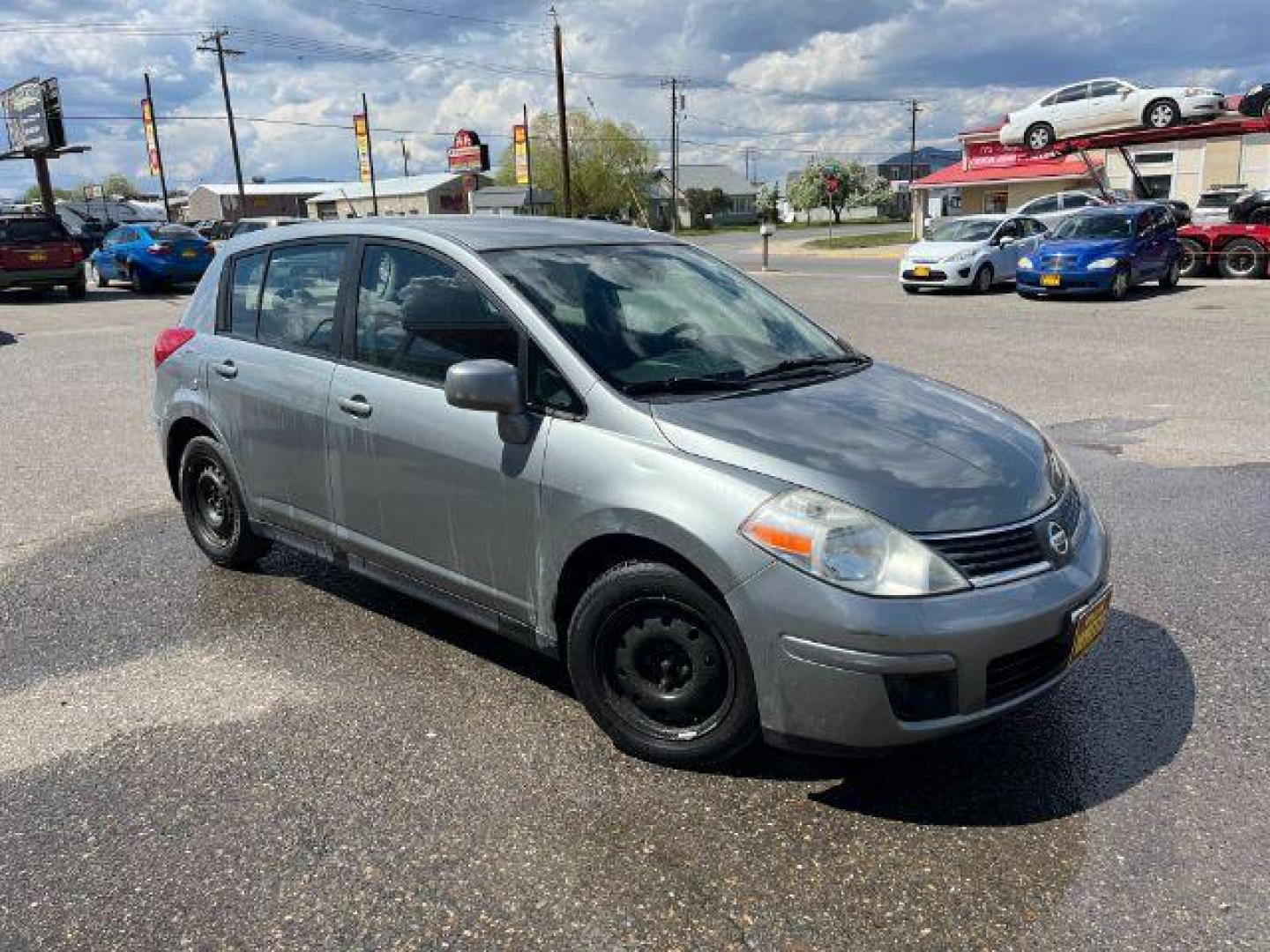 2009 Nissan Versa 1.8 S Hatchback (3N1BC13EX9L) with an 1.8L L4 DOHC 16V engine, located at 1821 N Montana Ave., Helena, MT, 59601, 46.603447, -112.022781 - Photo#1