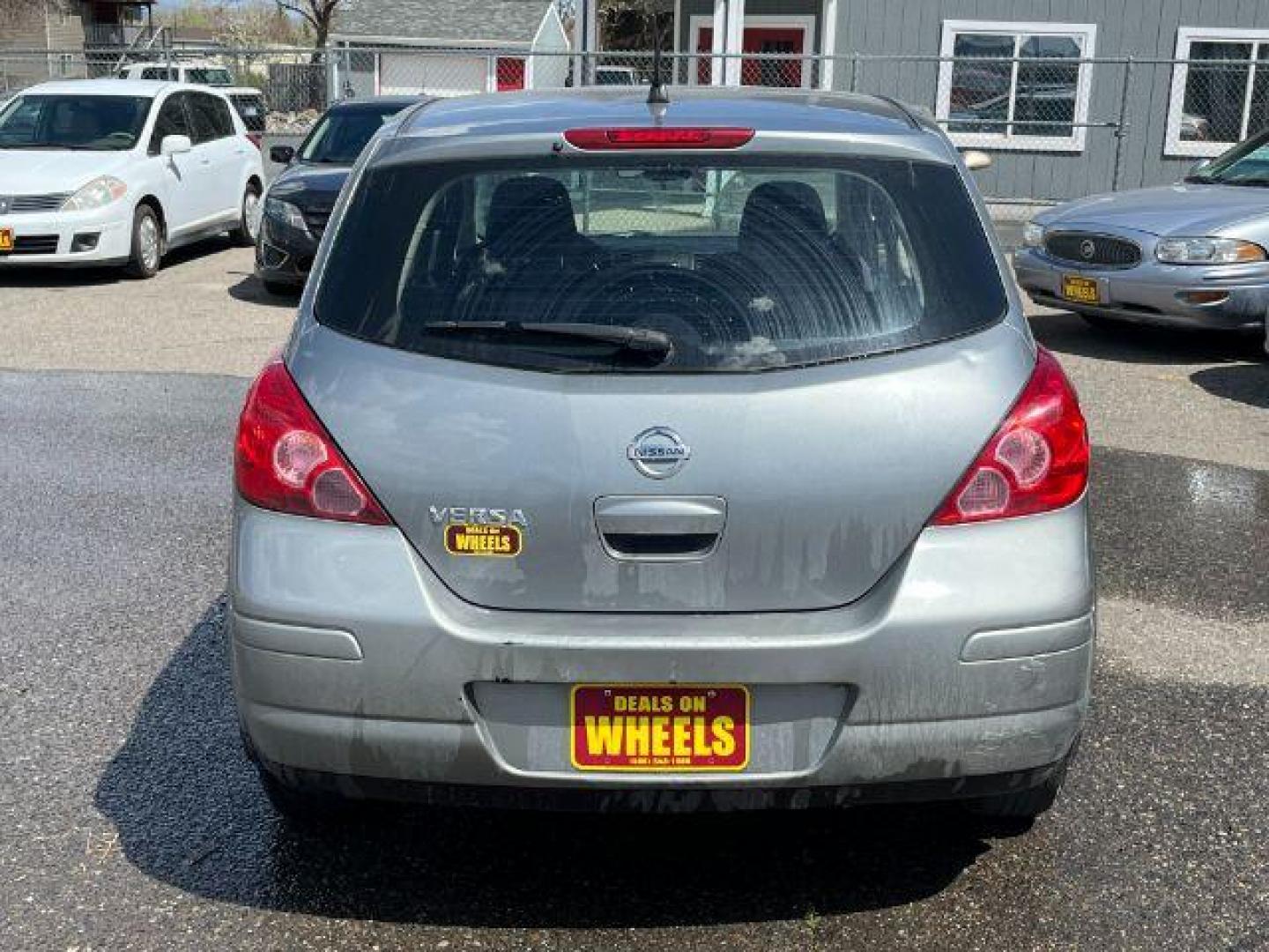 2009 Nissan Versa 1.8 S Hatchback (3N1BC13EX9L) with an 1.8L L4 DOHC 16V engine, located at 1821 N Montana Ave., Helena, MT, 59601, 46.603447, -112.022781 - Photo#3