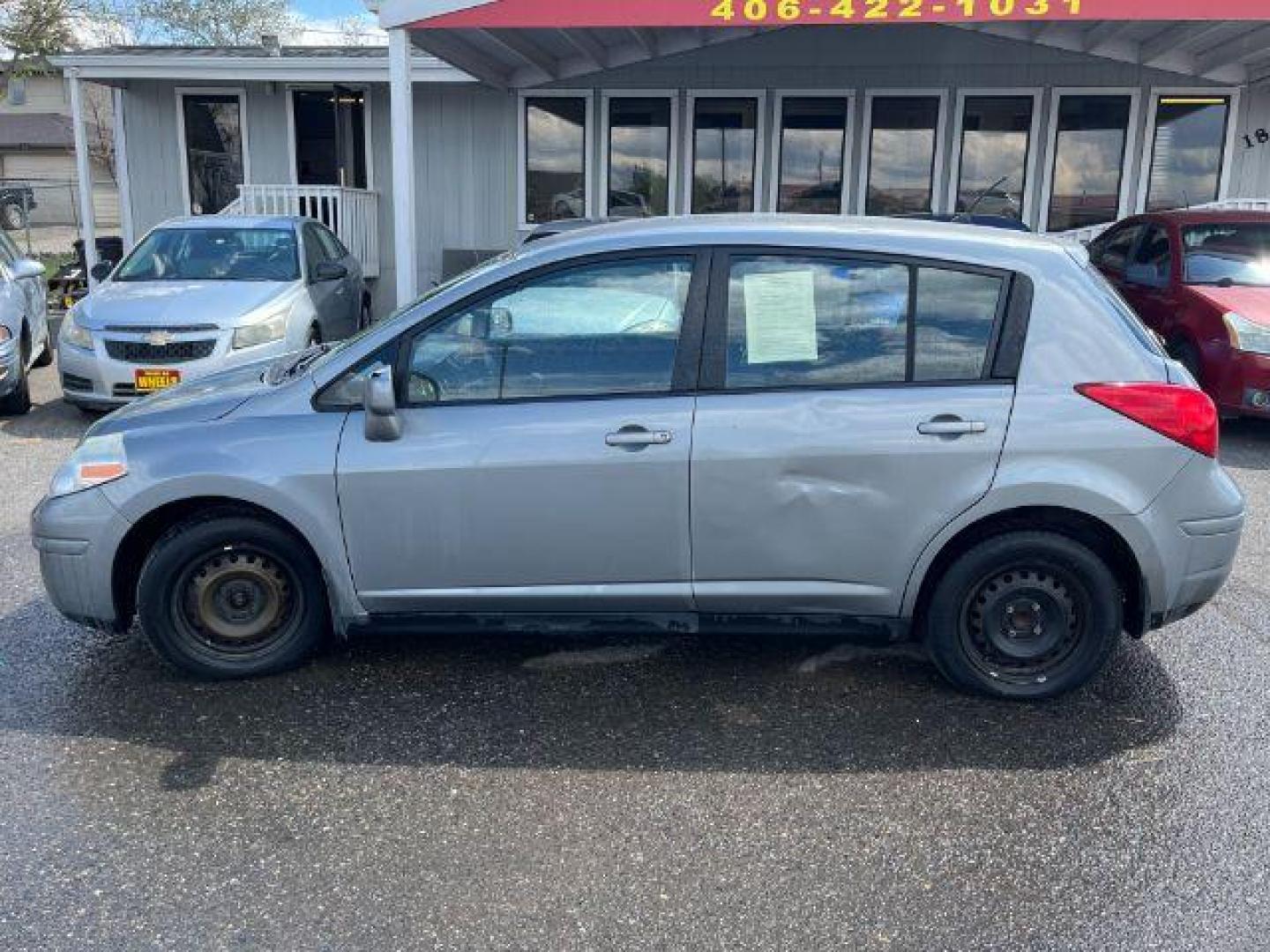 2009 Nissan Versa 1.8 S Hatchback (3N1BC13EX9L) with an 1.8L L4 DOHC 16V engine, located at 1821 N Montana Ave., Helena, MT, 59601, 46.603447, -112.022781 - Photo#4