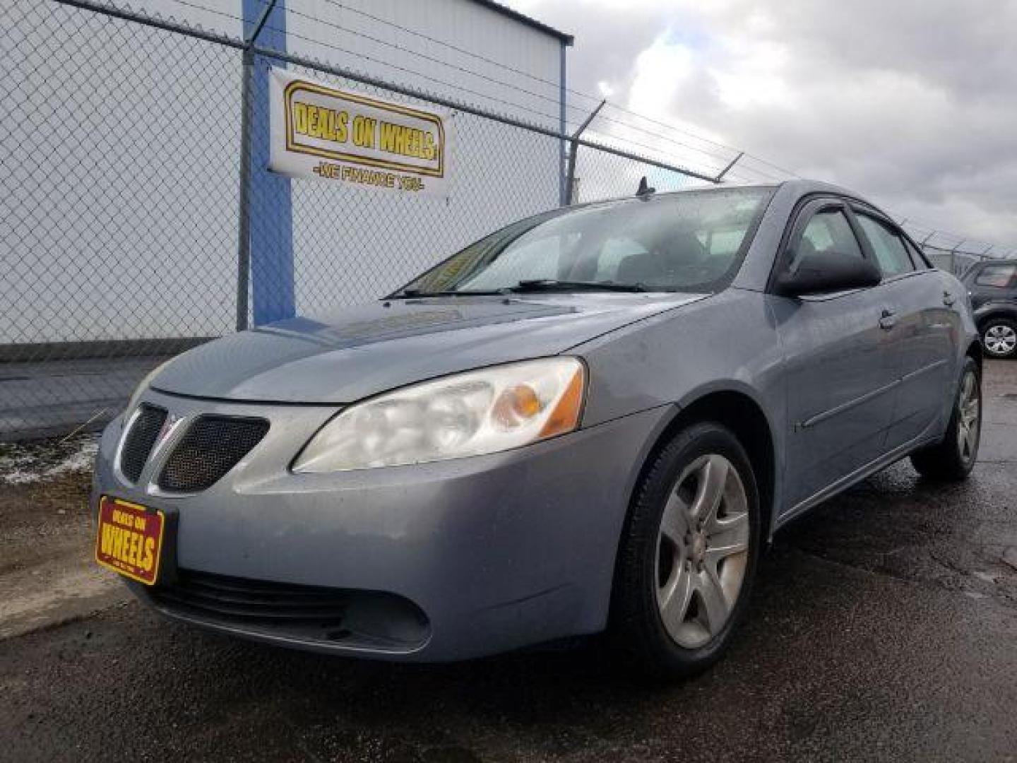 2009 Pontiac G6 Sedan (1G2ZG57BX94) with an 2.4L L4 DOHC 16V engine, 4-Speed Automatic transmission, located at 4801 10th Ave S,, Great Falls, MT, 59405, 47.494347, -111.229942 - Photo#0