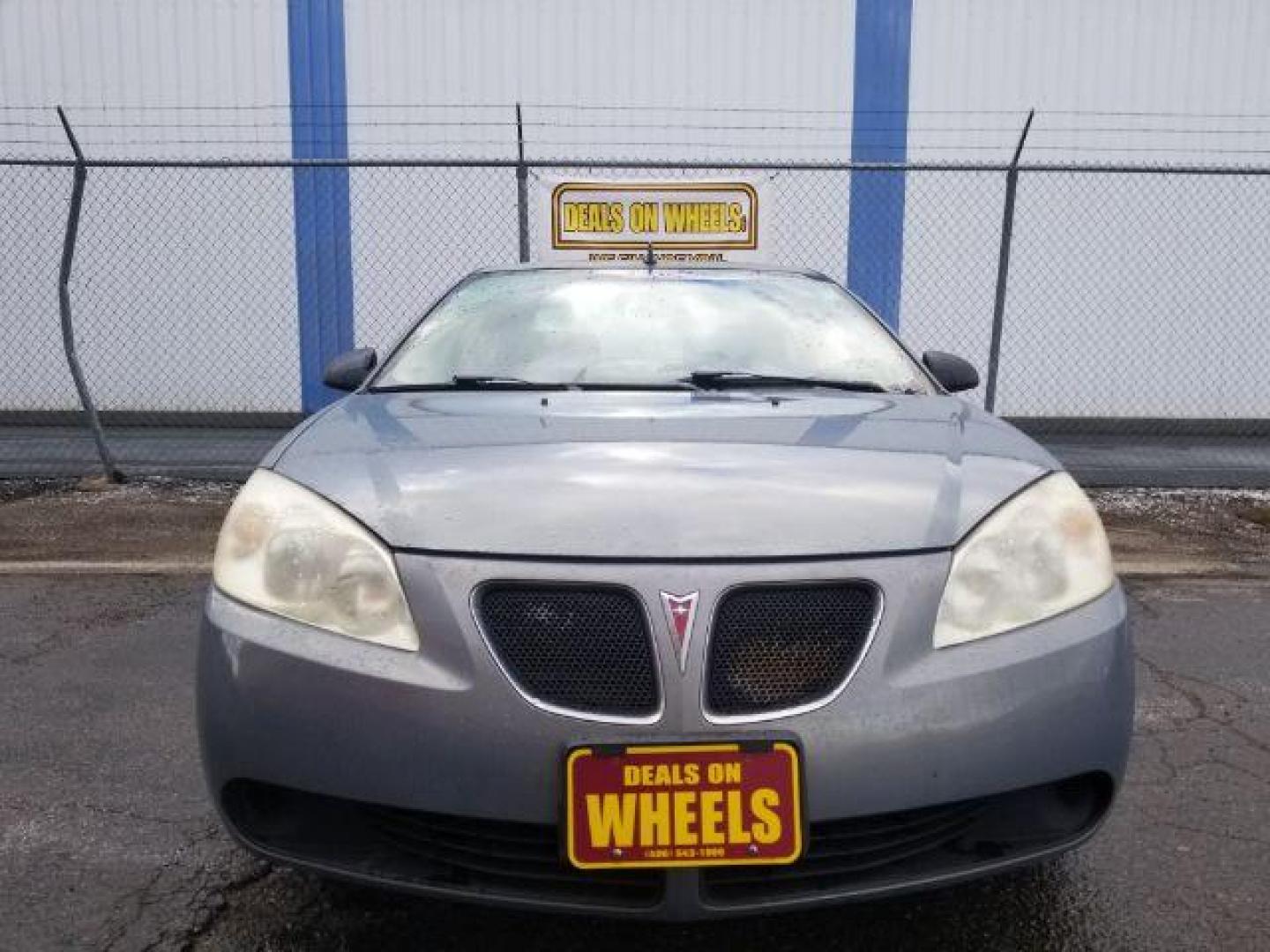 2009 Pontiac G6 Sedan (1G2ZG57BX94) with an 2.4L L4 DOHC 16V engine, 4-Speed Automatic transmission, located at 4801 10th Ave S,, Great Falls, MT, 59405, 47.494347, -111.229942 - Photo#1