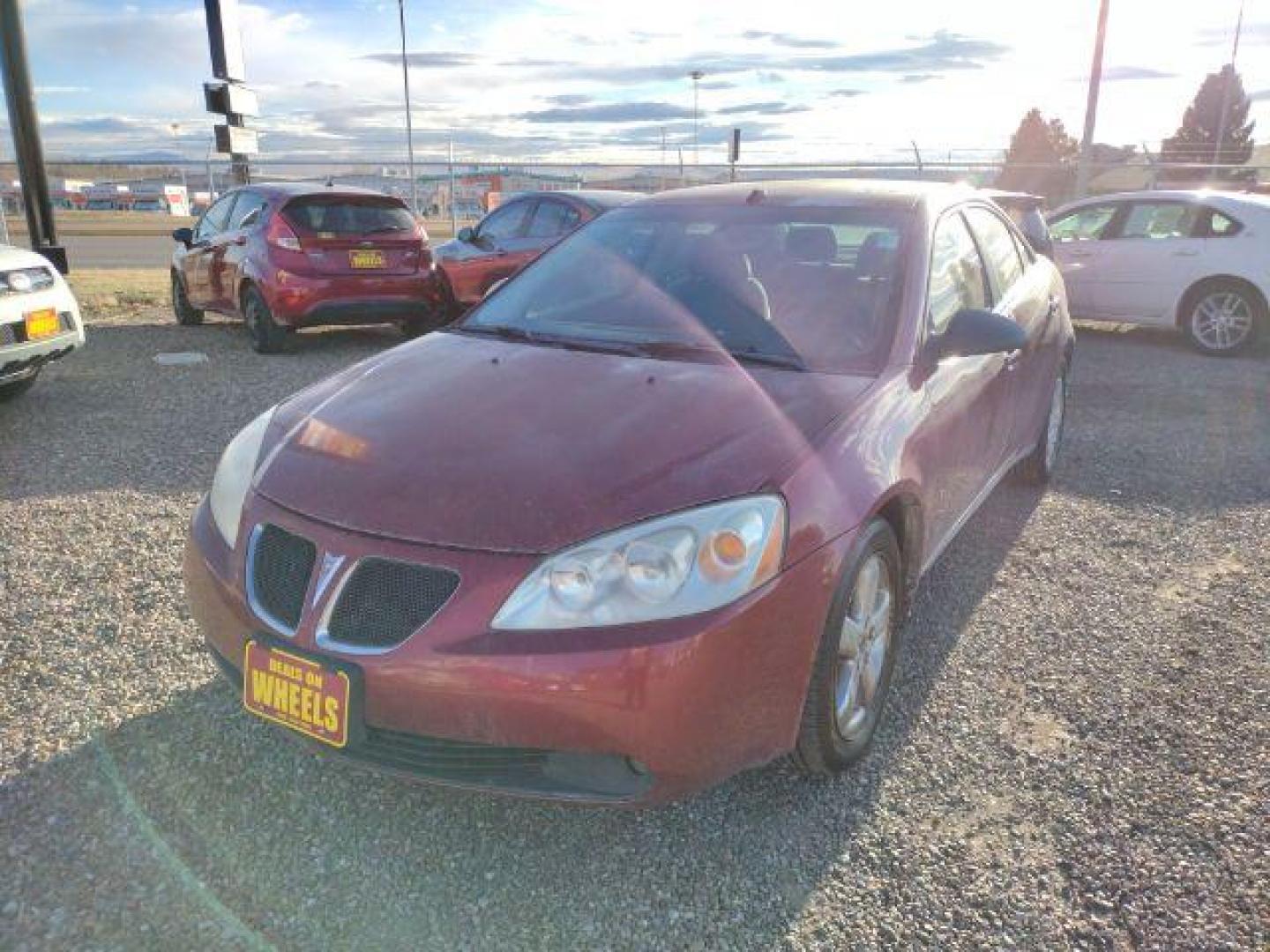 2009 Performance Red Tintcoat Pontiac G6 GT Sedan (1G2ZH57N294) with an 3.5L V6 OHV 12V engine, 4-Speed Automatic transmission, located at 4801 10th Ave S,, Great Falls, MT, 59405, 47.494347, -111.229942 - Photo#0