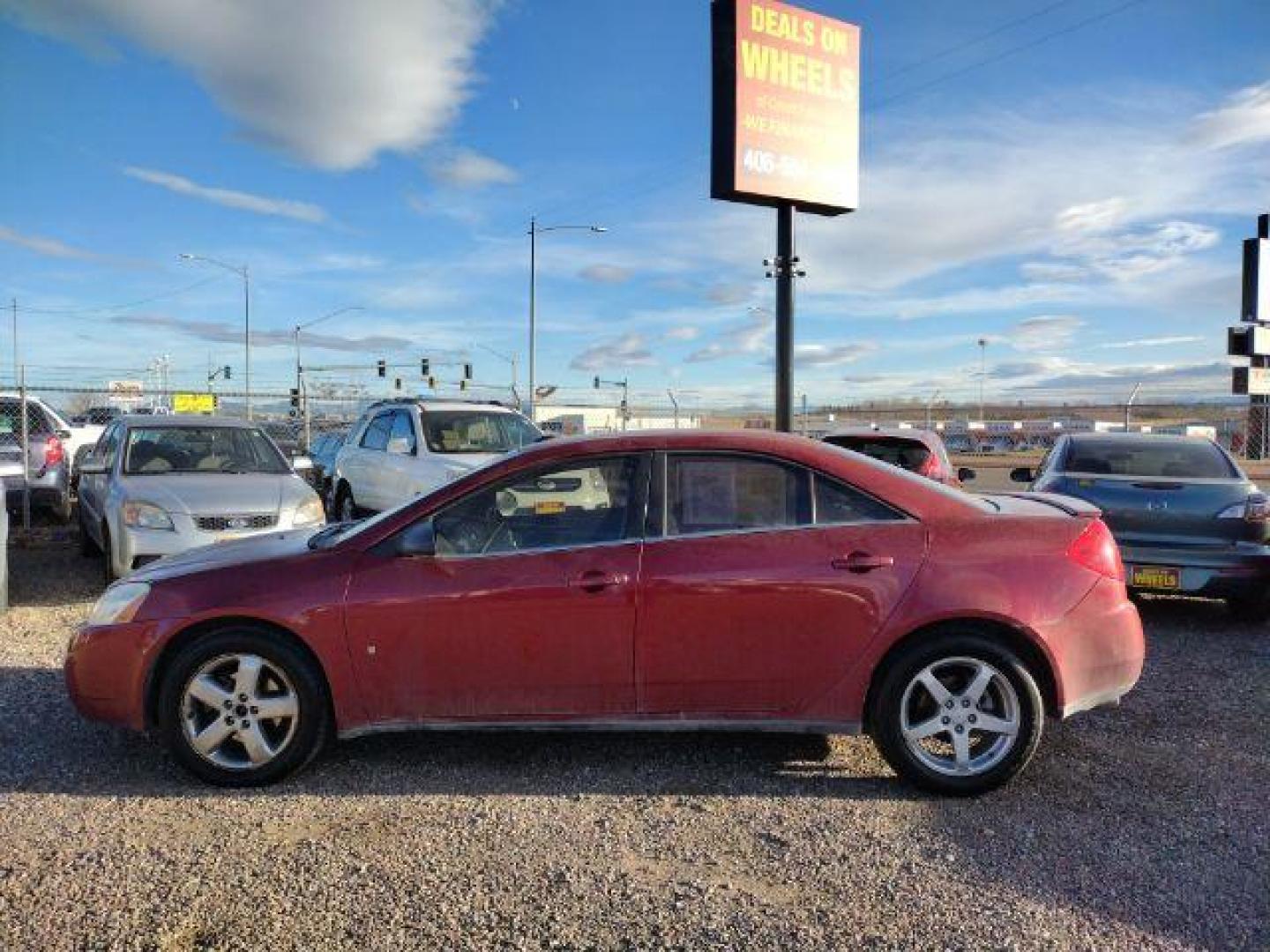 2009 Performance Red Tintcoat Pontiac G6 GT Sedan (1G2ZH57N294) with an 3.5L V6 OHV 12V engine, 4-Speed Automatic transmission, located at 4801 10th Ave S,, Great Falls, MT, 59405, 47.494347, -111.229942 - Photo#1