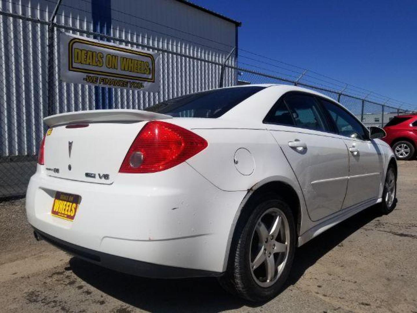 2009 Pontiac G6 Sedan (1G2ZJ57K894) with an 3.5L V6 OHV 12V engine, 4-Speed Automatic transmission, located at 4801 10th Ave S,, Great Falls, MT, 59405, 47.494347, -111.229942 - Photo#4