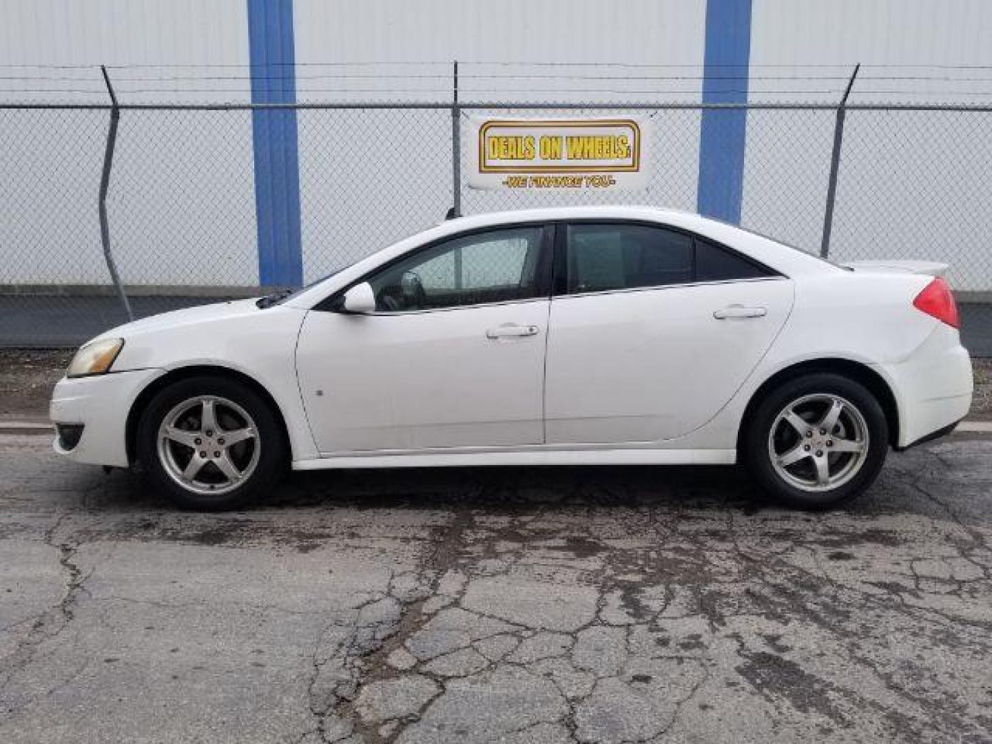 2009 Pontiac G6 Sedan (1G2ZJ57K694) with an 3.5L V6 OHV 12V engine, 4-Speed Automatic transmission, located at 601 E. Idaho St., Kalispell, MT, 59901, 48.203983, -114.308662 - Photo#2