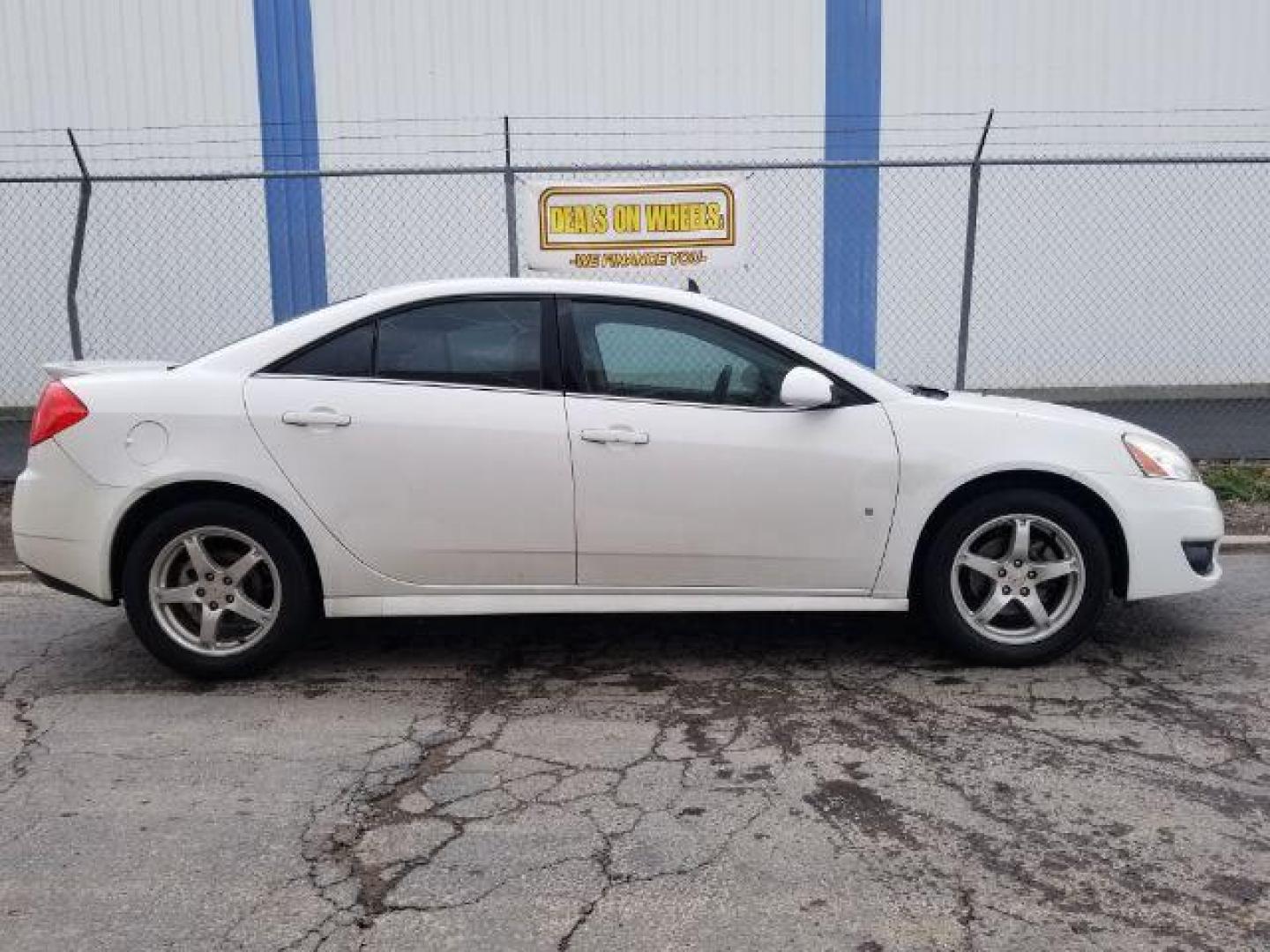 2009 Pontiac G6 Sedan (1G2ZJ57K694) with an 3.5L V6 OHV 12V engine, 4-Speed Automatic transmission, located at 601 E. Idaho St., Kalispell, MT, 59901, 48.203983, -114.308662 - Photo#5