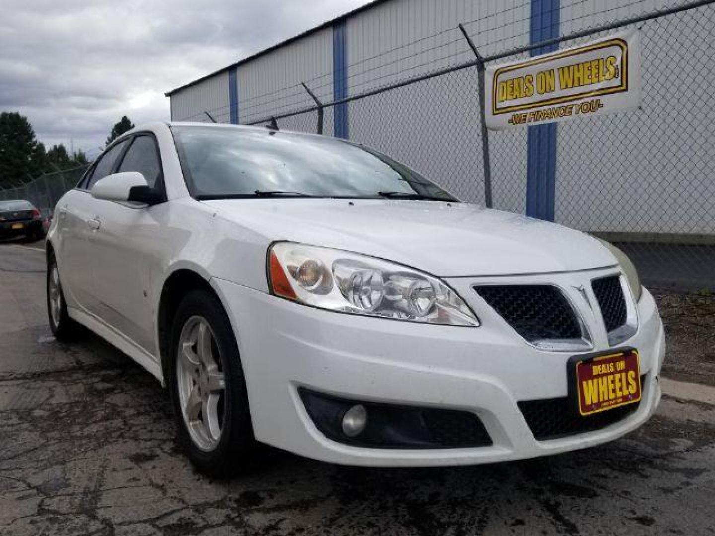 2009 Pontiac G6 Sedan (1G2ZJ57K694) with an 3.5L V6 OHV 12V engine, 4-Speed Automatic transmission, located at 601 E. Idaho St., Kalispell, MT, 59901, 48.203983, -114.308662 - Photo#6