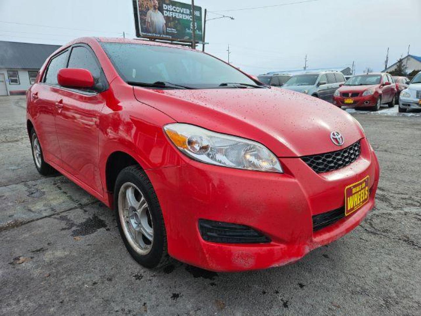 2009 Radiant Red Toyota Matrix Base 5-Speed MT (2T1KU40E09C) with an 1.8L L4 DOHC 16V engine, 5-Speed Manual transmission, located at 601 E. Idaho St., Kalispell, MT, 59901, 48.203983, -114.308662 - Photo#6