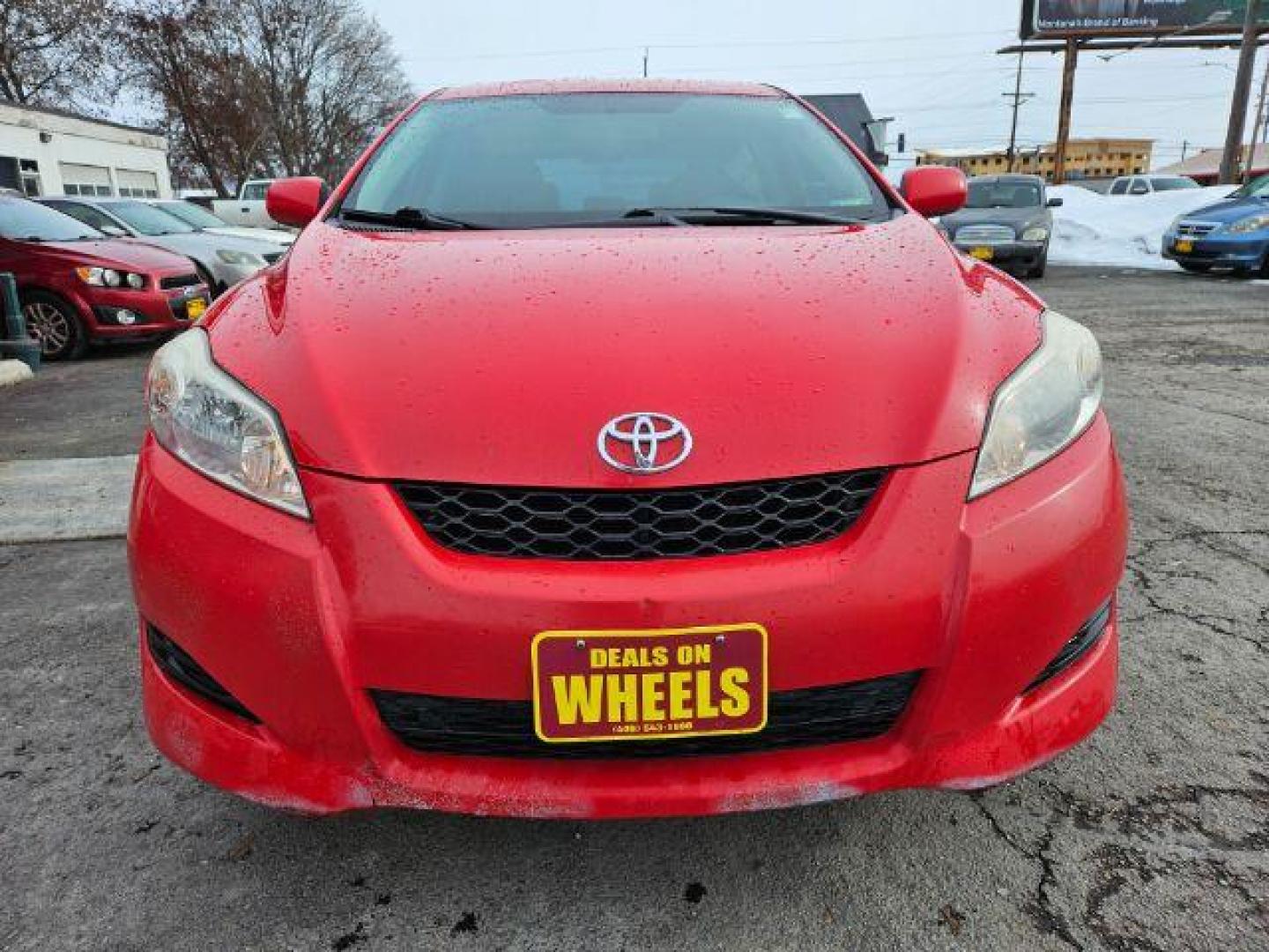 2009 Radiant Red Toyota Matrix Base 5-Speed MT (2T1KU40E09C) with an 1.8L L4 DOHC 16V engine, 5-Speed Manual transmission, located at 601 E. Idaho St., Kalispell, MT, 59901, 48.203983, -114.308662 - Photo#7