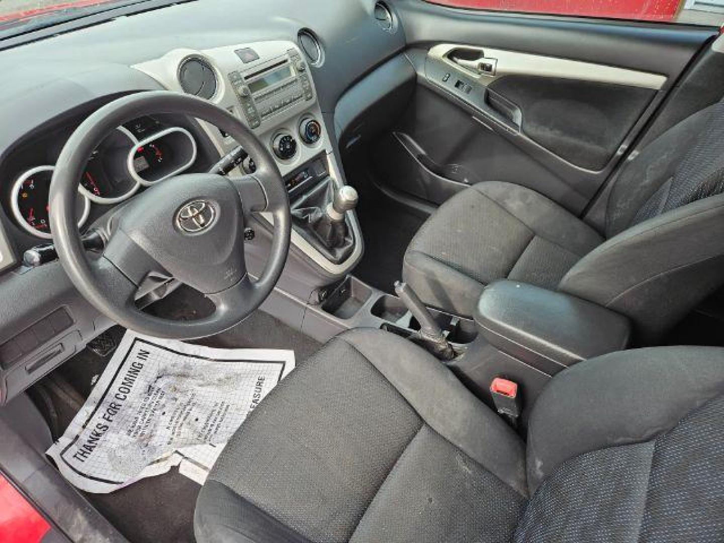 2009 Radiant Red Toyota Matrix Base 5-Speed MT (2T1KU40E09C) with an 1.8L L4 DOHC 16V engine, 5-Speed Manual transmission, located at 601 E. Idaho St., Kalispell, MT, 59901, 48.203983, -114.308662 - Photo#8