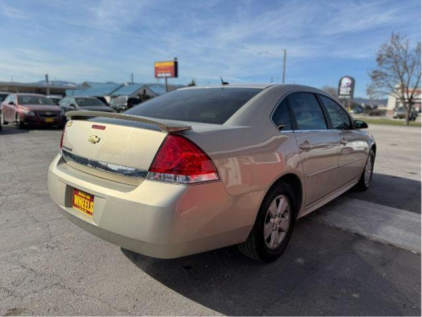 2010 Chevrolet Impala LT (2G1WB5ENXA1) with an 3.5L V6 OHV 12V engine, 4-Speed Automatic transmission, located at 601 E. Idaho St., Kalispell, MT, 59901, 48.203983, -114.308662 - Photo#4