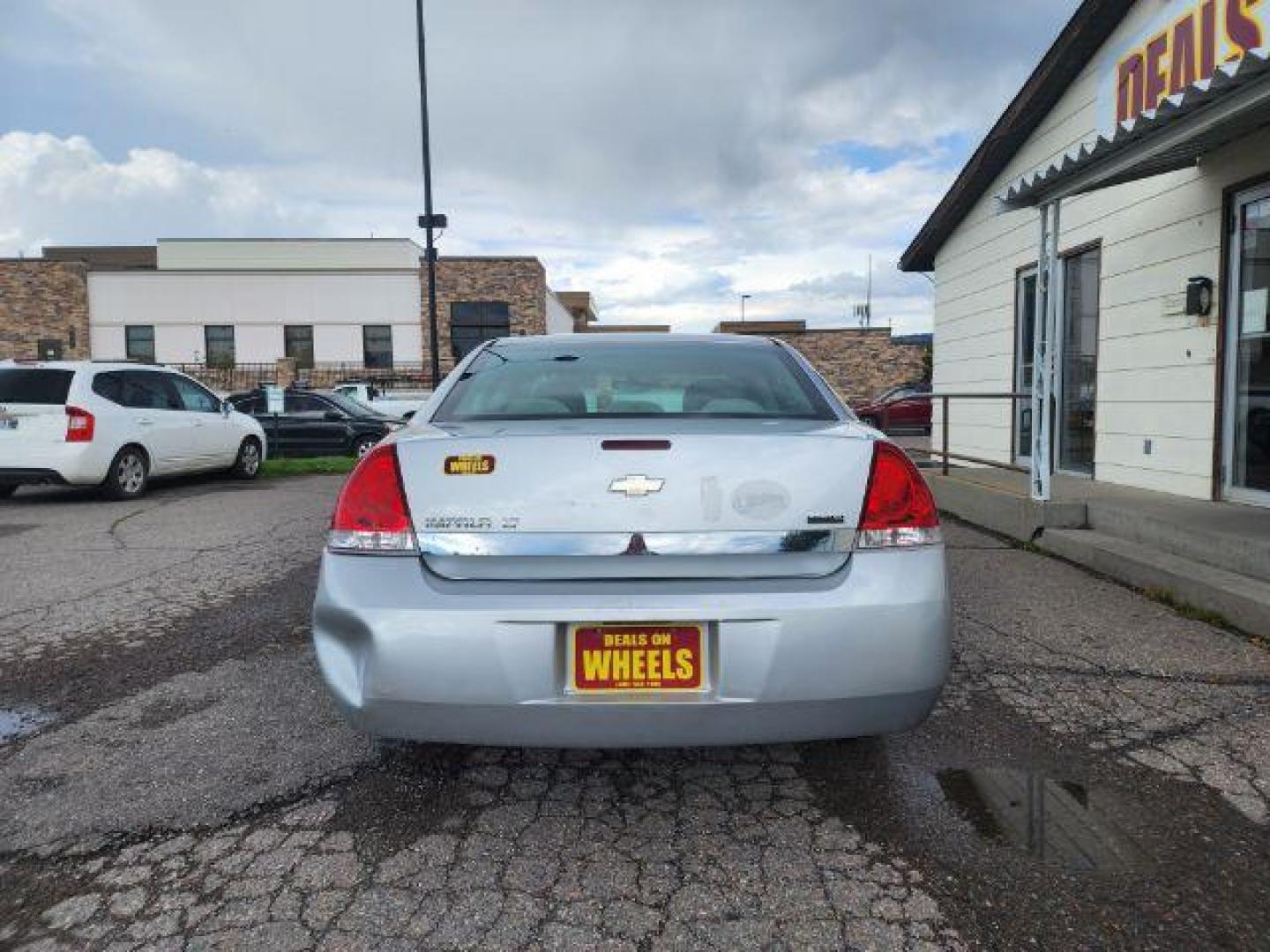 2010 Chevrolet Impala LT (2G1WB5EK4A1) with an 3.5L V6 OHV 12V FFV engine, 4-Speed Automatic transmission, located at 1800 West Broadway, Missoula, 59808, (406) 543-1986, 46.881348, -114.023628 - Photo#3