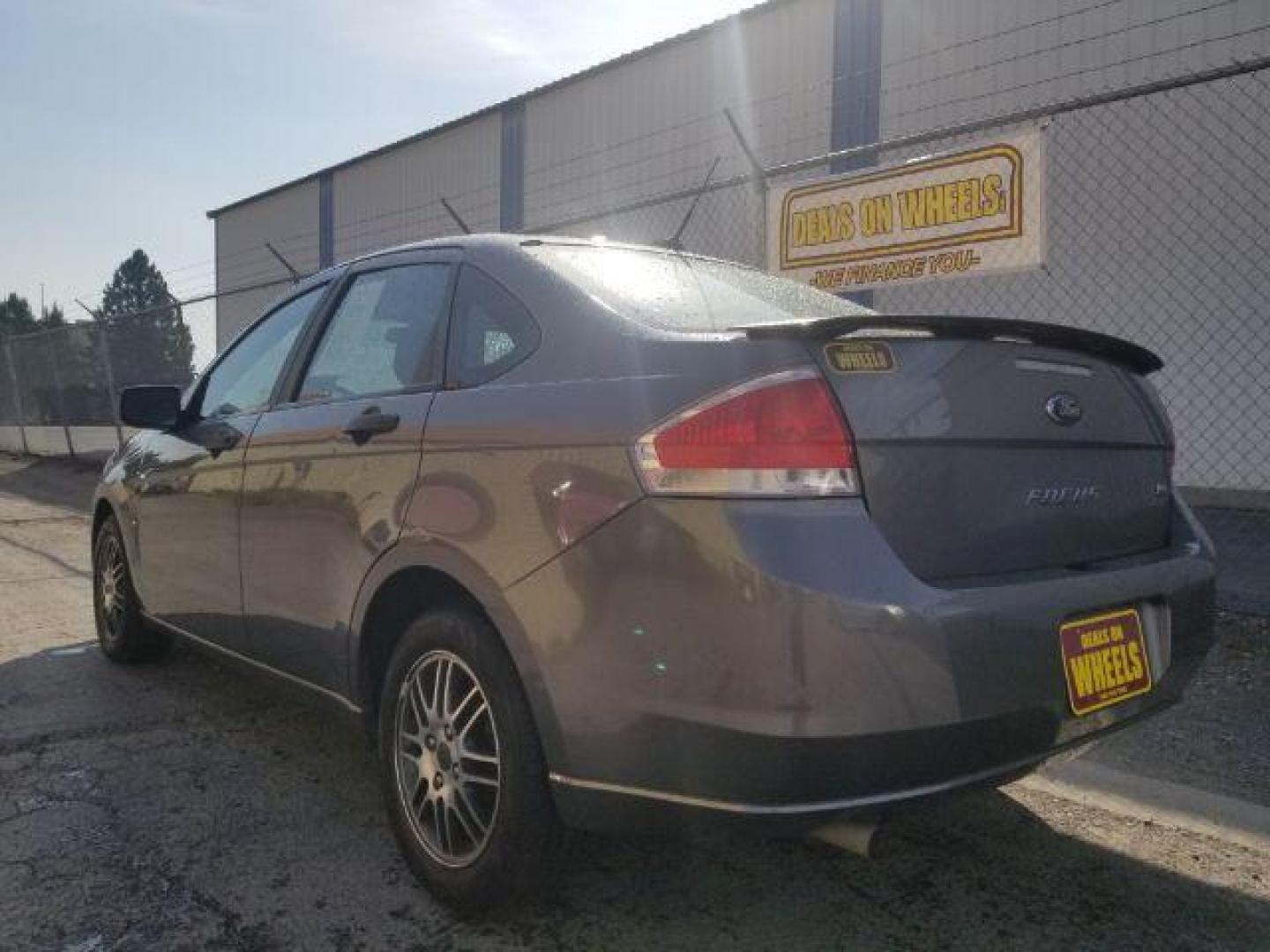 2010 Ford Focus SE Sedan (1FAHP3FNXAW) with an 2.0L L4 DOHC 16V engine, located at 4047 Montana Ave., Billings, MT, 59101, 45.770847, -108.529800 - Photo#5