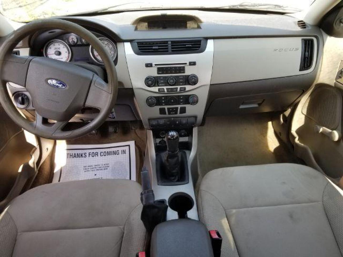 2010 /Medium Stone Cloth Interior Ford Focus S Sedan (1FAHP3EN5AW) with an 2.0L L4 DOHC 16V engine, 5-Speed Manual transmission, located at 4801 10th Ave S,, Great Falls, MT, 59405, 47.494347, -111.229942 - Photo#10