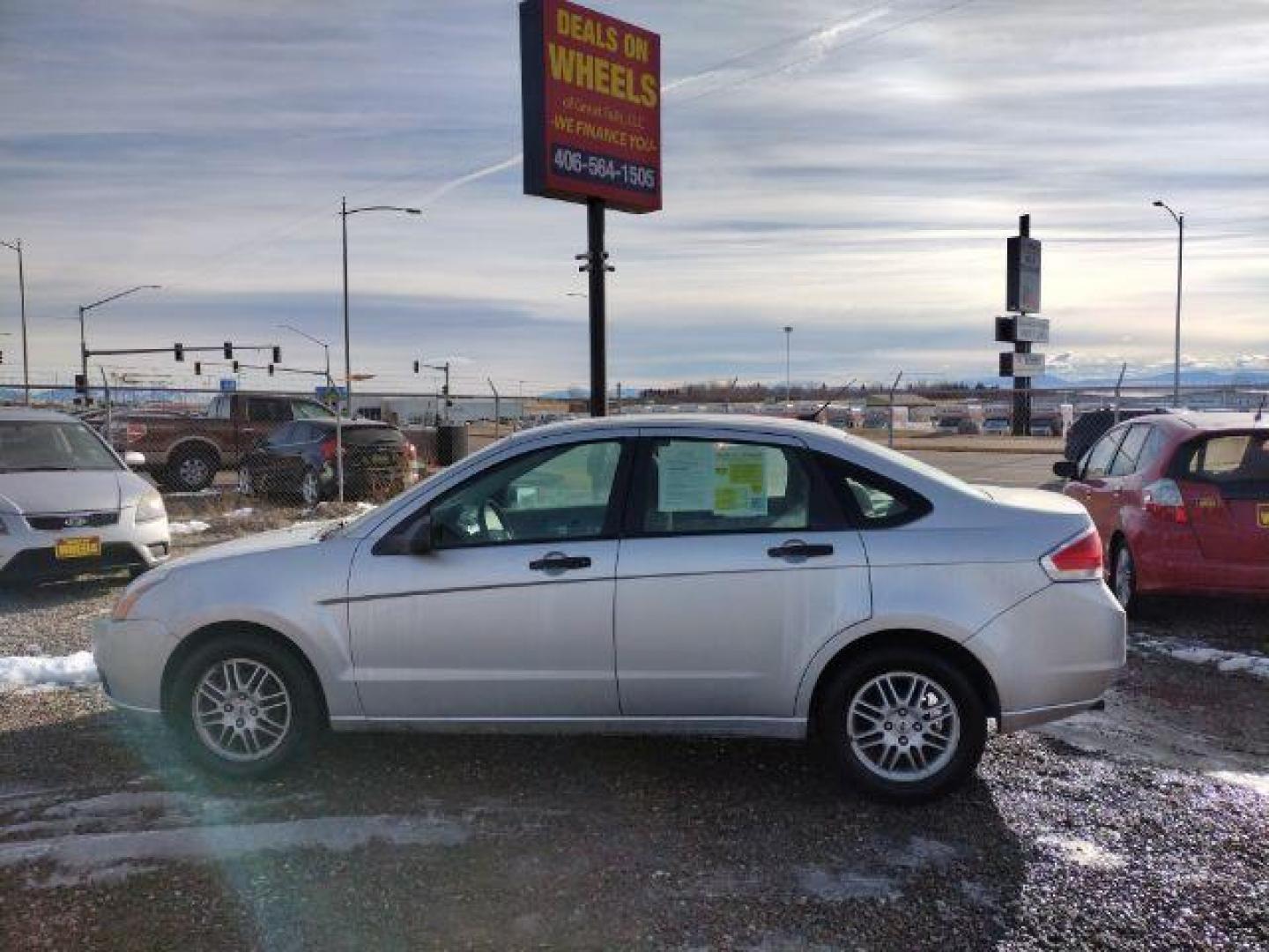 2010 Ford Focus SE Sedan (1FAHP3FN2AW) with an 2.0L L4 DOHC 16V engine, located at 4801 10th Ave S,, Great Falls, MT, 59405, 47.494347, -111.229942 - Photo#1