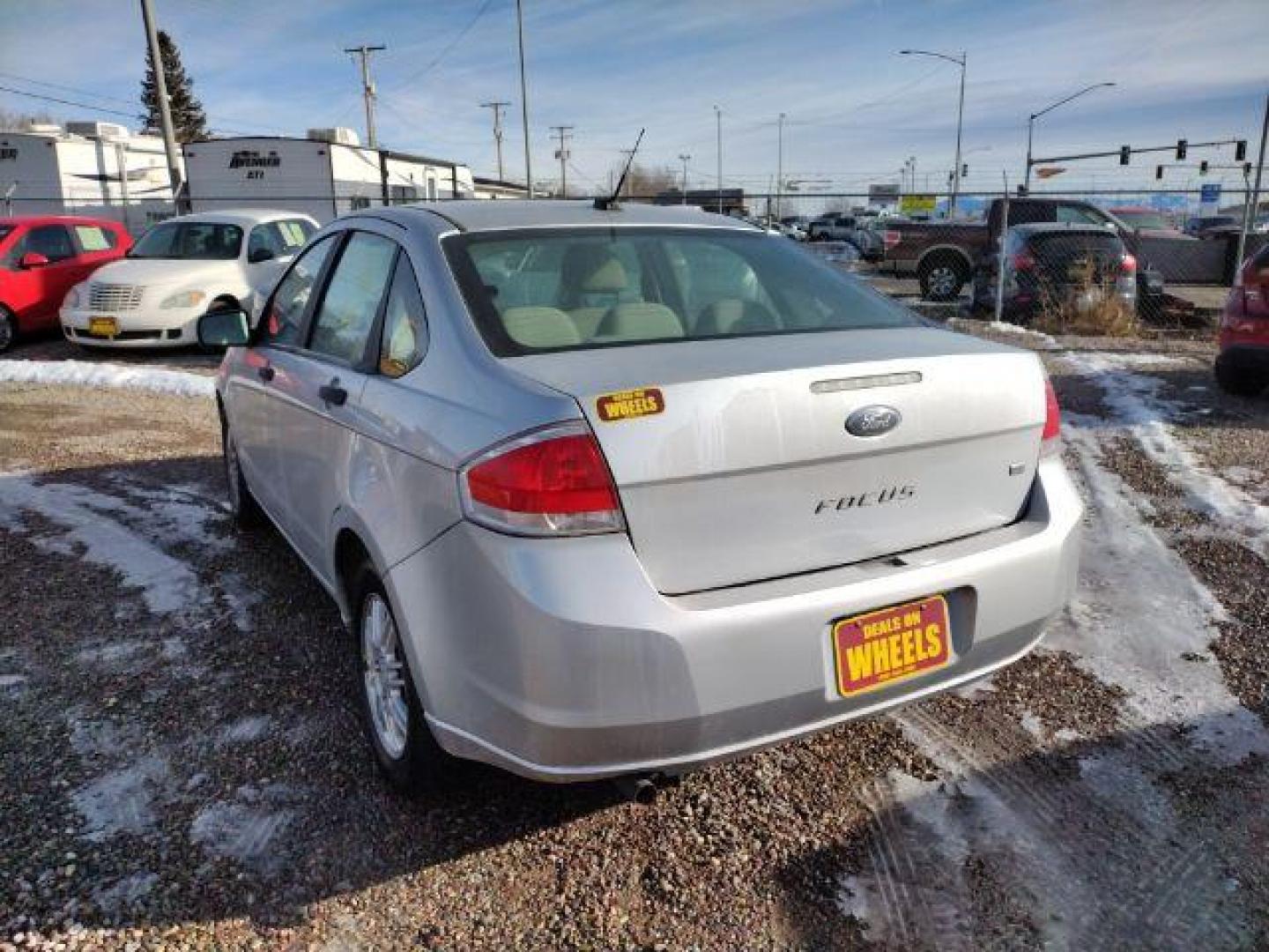 2010 Ford Focus SE Sedan (1FAHP3FN2AW) with an 2.0L L4 DOHC 16V engine, located at 4801 10th Ave S,, Great Falls, MT, 59405, 47.494347, -111.229942 - Photo#2