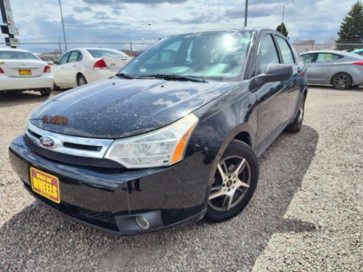 2010 Ford Focus SE Sedan (1FAHP3FN6AW) with an 2.0L L4 DOHC 16V engine, located at 4801 10th Ave S,, Great Falls, MT, 59405, 47.494347, -111.229942 - Photo#0