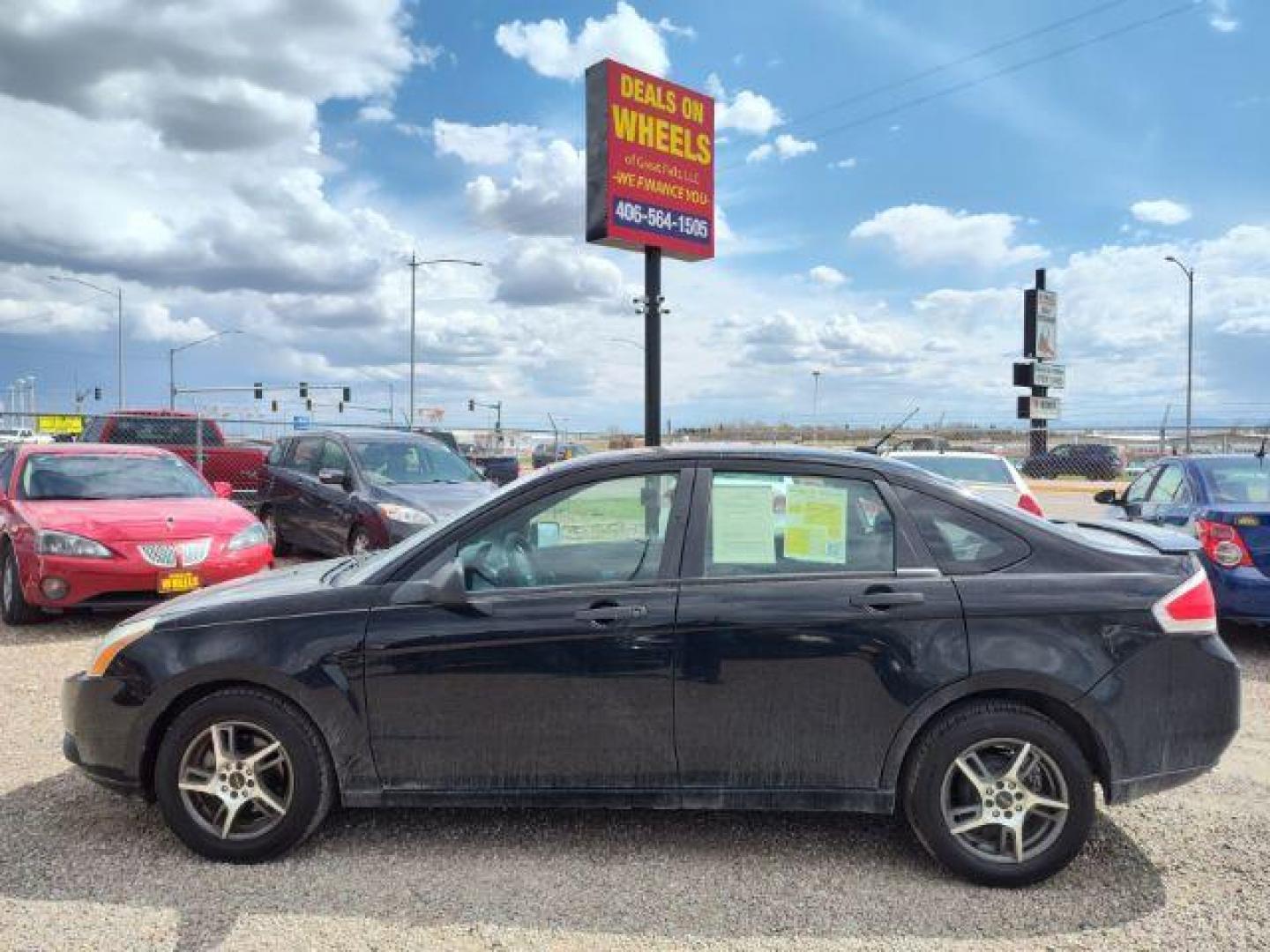 2010 Ford Focus SE Sedan (1FAHP3FN6AW) with an 2.0L L4 DOHC 16V engine, located at 4801 10th Ave S,, Great Falls, MT, 59405, 47.494347, -111.229942 - Photo#1