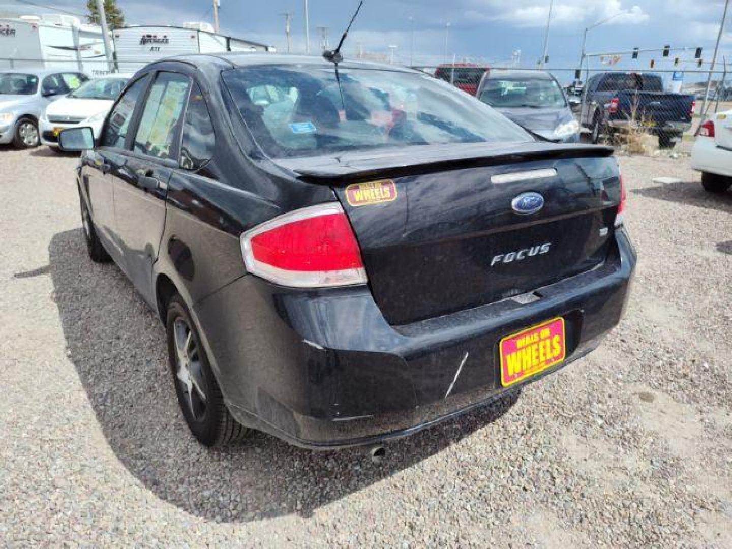 2010 Ford Focus SE Sedan (1FAHP3FN6AW) with an 2.0L L4 DOHC 16V engine, located at 4801 10th Ave S,, Great Falls, MT, 59405, 47.494347, -111.229942 - Photo#2