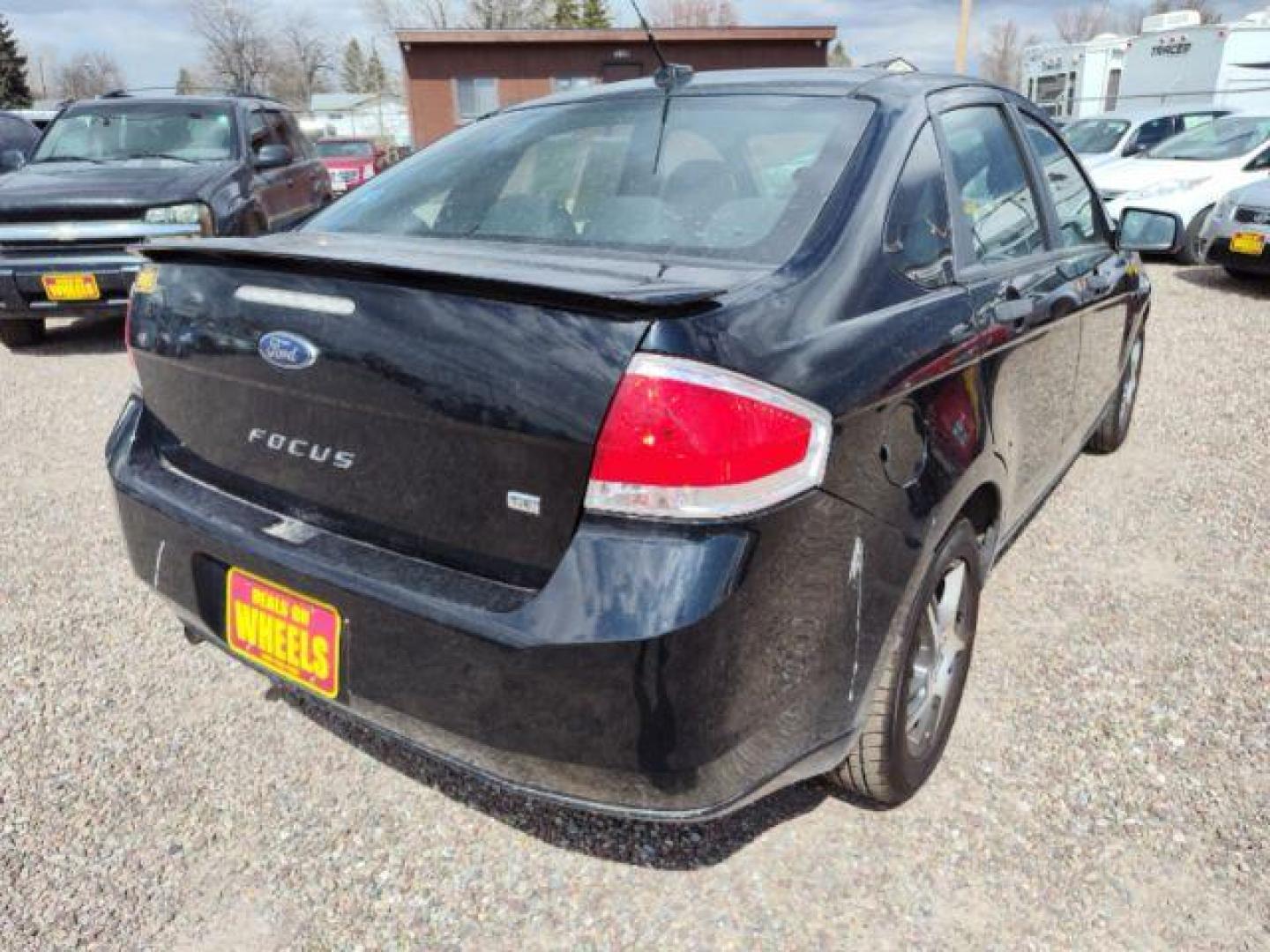 2010 Ford Focus SE Sedan (1FAHP3FN6AW) with an 2.0L L4 DOHC 16V engine, located at 4801 10th Ave S,, Great Falls, MT, 59405, 47.494347, -111.229942 - Photo#4