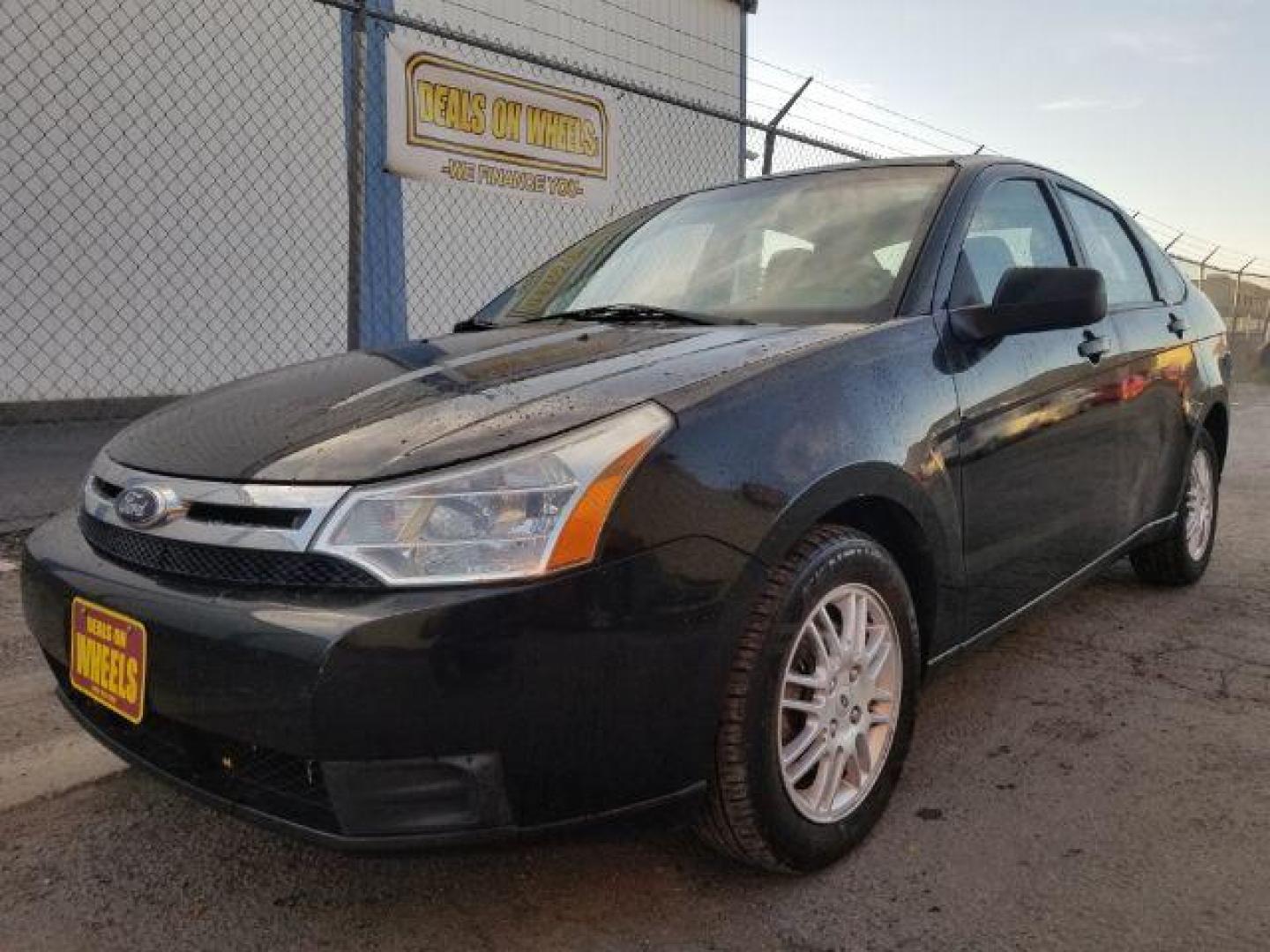 2010 Ford Focus SE Sedan (1FAHP3FN5AW) with an 2.0L L4 DOHC 16V engine, located at 601 E. Idaho St., Kalispell, MT, 59901, 48.203983, -114.308662 - Photo#0