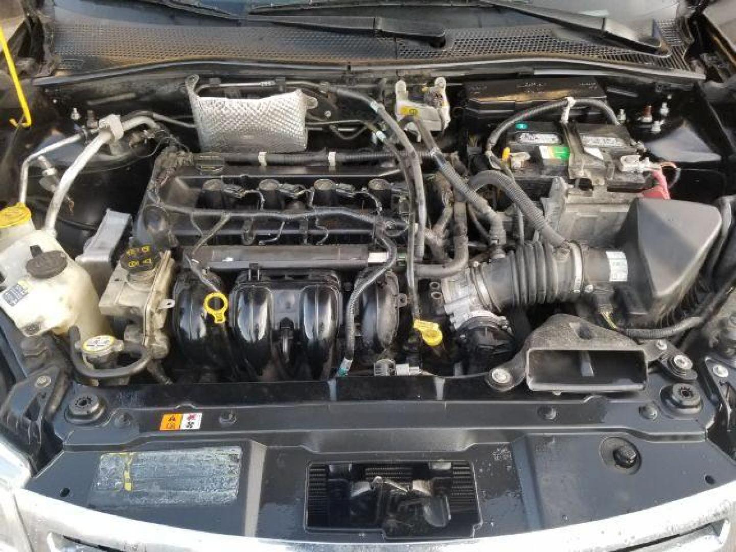 2010 Ford Focus SE Sedan (1FAHP3FN5AW) with an 2.0L L4 DOHC 16V engine, located at 601 E. Idaho St., Kalispell, MT, 59901, 48.203983, -114.308662 - Photo#13