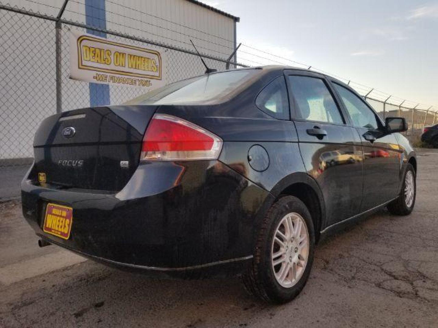 2010 Ford Focus SE Sedan (1FAHP3FN5AW) with an 2.0L L4 DOHC 16V engine, located at 601 E. Idaho St., Kalispell, MT, 59901, 48.203983, -114.308662 - Photo#4