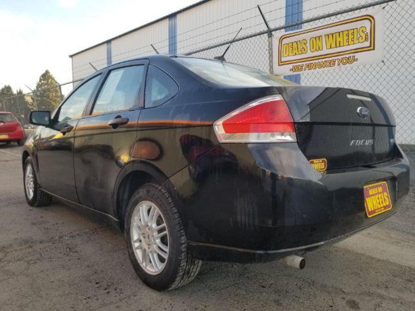 2010 Ford Focus SE Sedan (1FAHP3FN5AW) with an 2.0L L4 DOHC 16V engine, located at 601 E. Idaho St., Kalispell, MT, 59901, 48.203983, -114.308662 - Photo#5