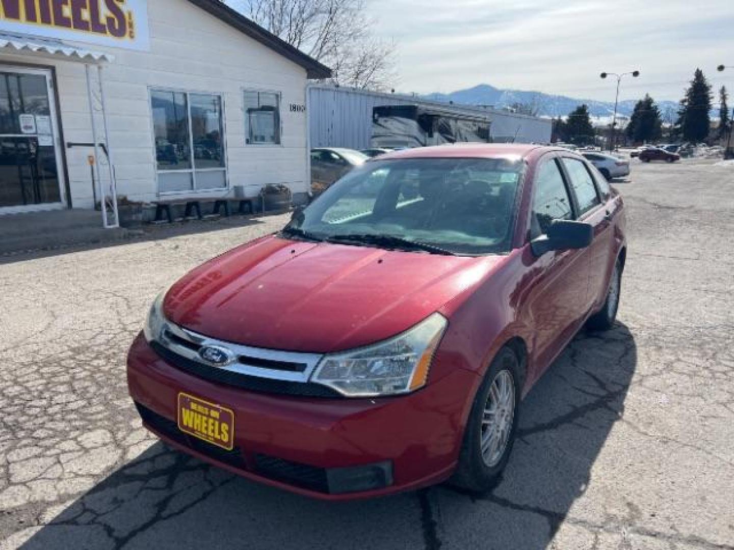 2010 Ford Focus SE Sedan (1FAHP3FN0AW) with an 2.0L L4 DOHC 16V engine, located at 1800 West Broadway, Missoula, 59808, (406) 543-1986, 46.881348, -114.023628 - Photo#0