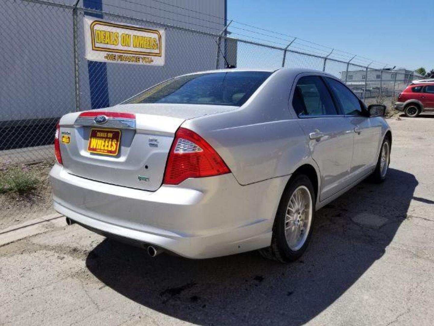 2010 Ford Fusion V6 SEL AWD (3FAHP0CG4AR) with an 3.0L V6 DOHC 24V engine, located at 4047 Montana Ave., Billings, MT, 59101, 45.770847, -108.529800 - Photo#4