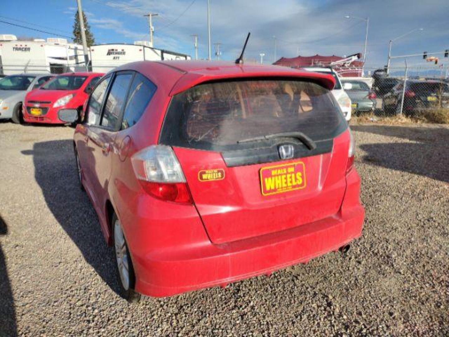 2010 Honda Fit Sport 5-Speed MT (JHMGE8G42AC) with an 1.5L L4 SOHC 16V engine, 5-Speed Manual transmission, located at 4801 10th Ave S,, Great Falls, MT, 59405, 47.494347, -111.229942 - Photo#2