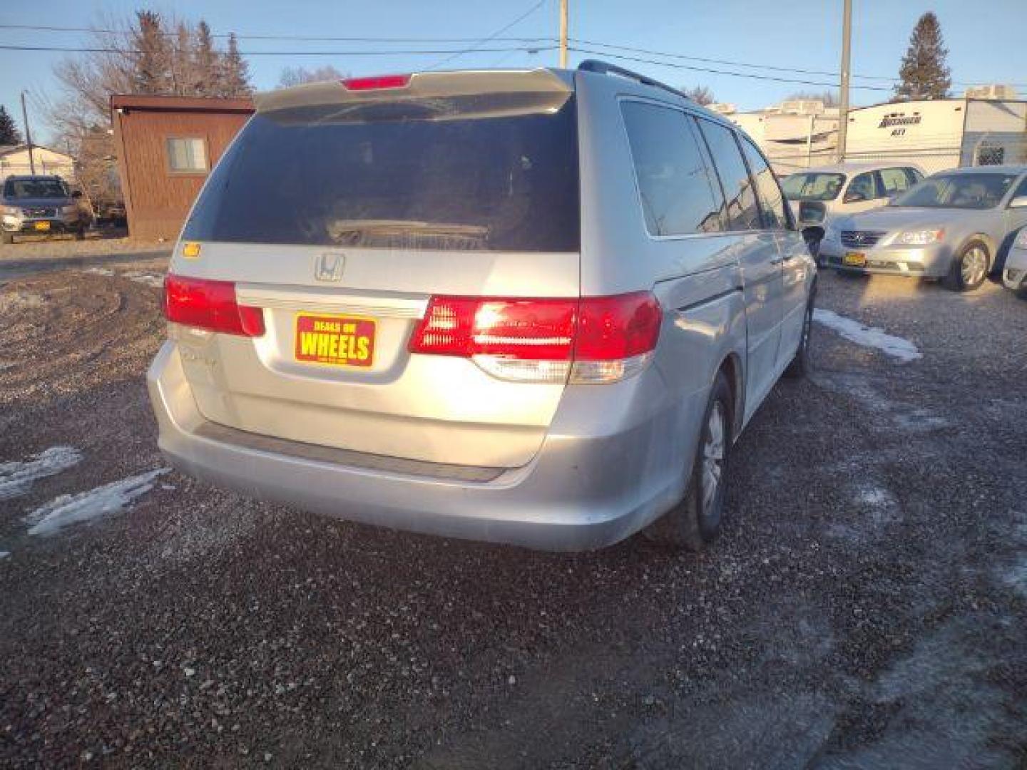 2010 Honda Odyssey EX (5FNRL3H48AB) with an 3.5L V6 SOHC 24V engine, 5-Speed Automatic transmission, located at 4801 10th Ave S,, Great Falls, MT, 59405, 47.494347, -111.229942 - Are you in the market for a reliable and spacious minivan? Look no further than this 2010 Honda Odyssey EX, available at DOW - Great Falls in Great Falls, MT. This pre-owned vehicle is priced at $14,495, making it an affordable option for families on a budget. With its impressive features and excell - Photo#8