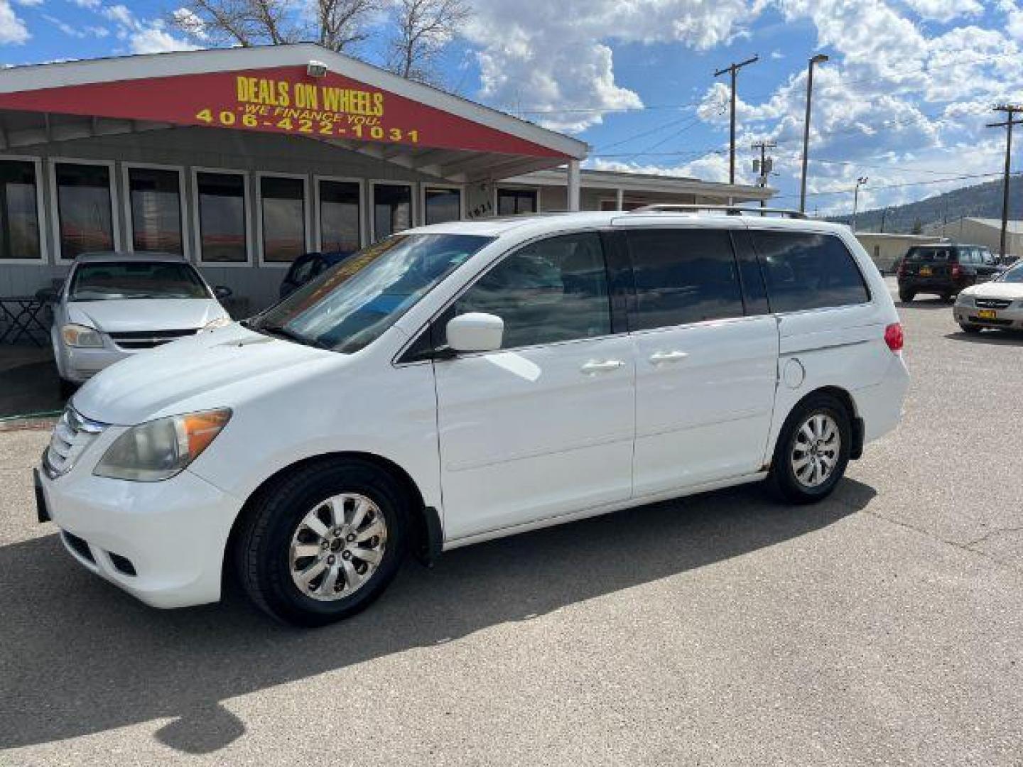 2010 Honda Odyssey EX-L w/ DVD and Navi (5FNRL3H74AB) with an 3.5L V6 SOHC 24V engine, 5-Speed Automatic transmission, located at 1821 N Montana Ave., Helena, MT, 59601, 46.603447, -112.022781 - Photo#0