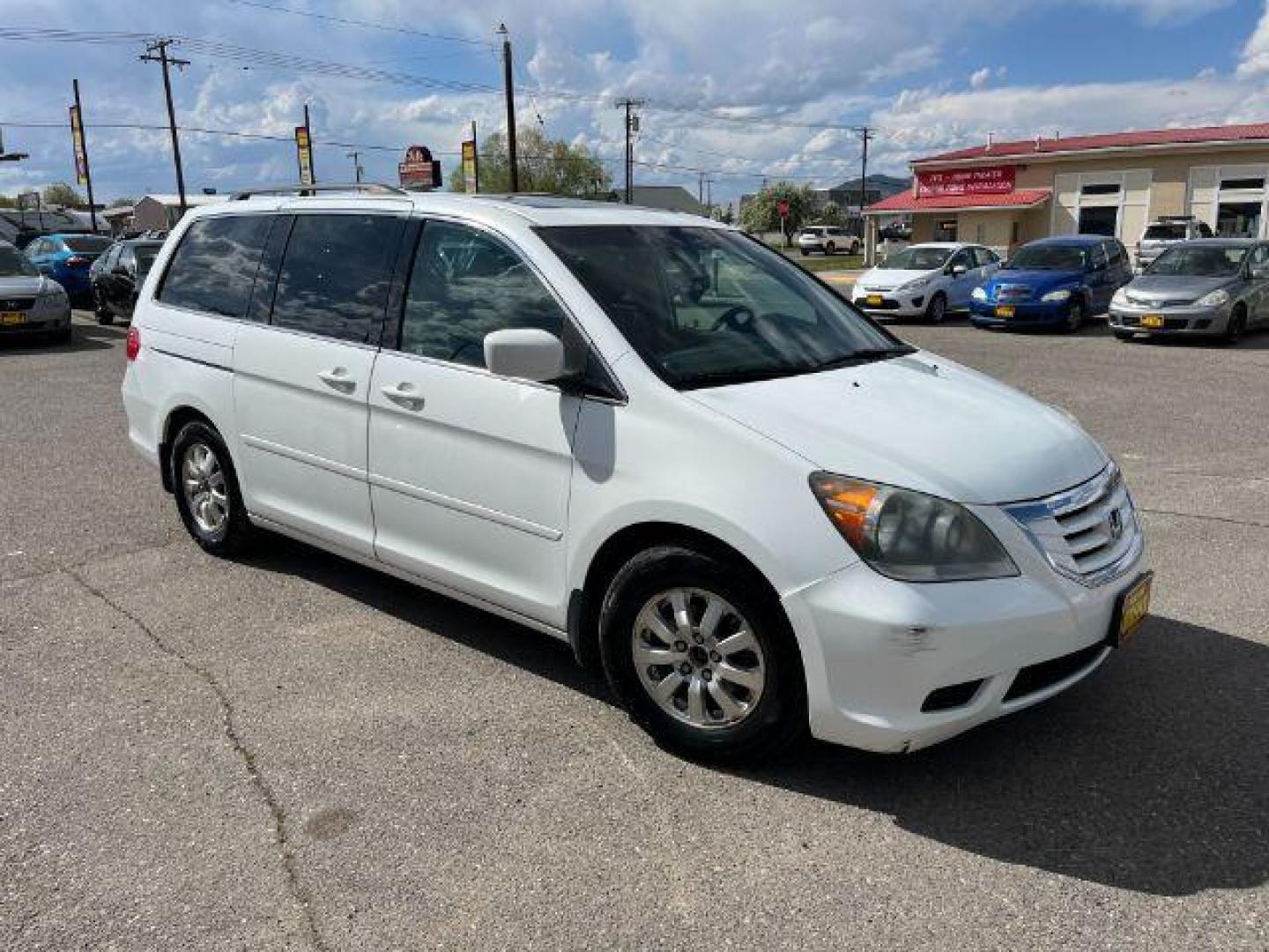 2010 Honda Odyssey EX-L w/ DVD and Navi (5FNRL3H74AB) with an 3.5L V6 SOHC 24V engine, 5-Speed Automatic transmission, located at 1821 N Montana Ave., Helena, MT, 59601, 46.603447, -112.022781 - Photo#2