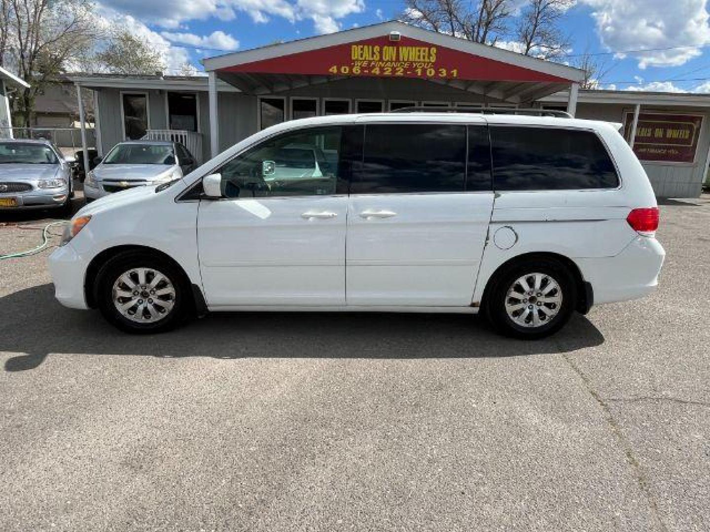 2010 Honda Odyssey EX-L w/ DVD and Navi (5FNRL3H74AB) with an 3.5L V6 SOHC 24V engine, 5-Speed Automatic transmission, located at 1821 N Montana Ave., Helena, MT, 59601, 46.603447, -112.022781 - Photo#5