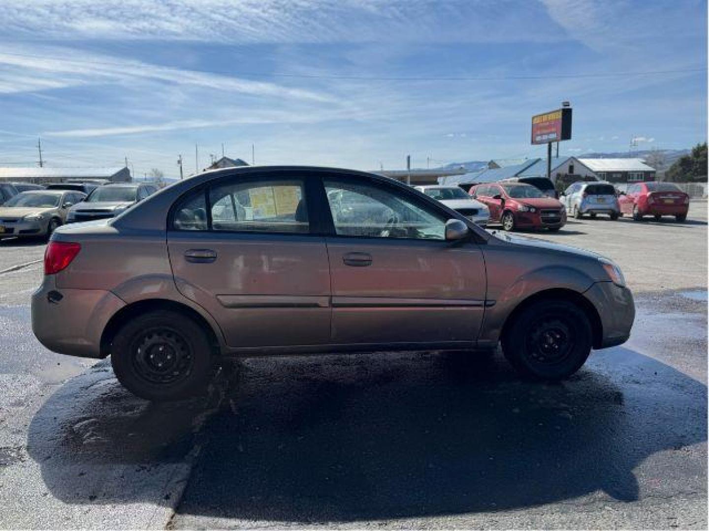 2010 Kia Rio LX (KNADH4A31A6) with an 1.6L L4 DOHC 16V engine, located at 601 E. Idaho St., Kalispell, MT, 59901, 48.203983, -114.308662 - Photo#1