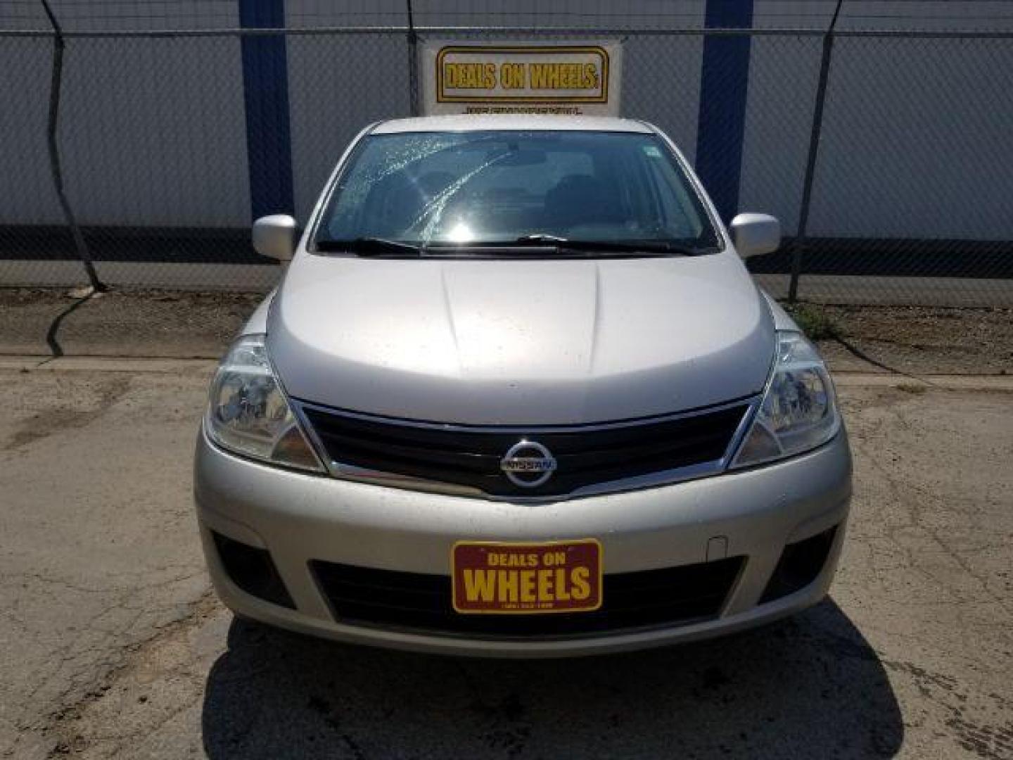 2010 Nissan Versa 1.8 S Sedan (3N1BC1AP9AL) with an 1.8L L4 DOHC 16V engine, located at 601 E. Idaho St., Kalispell, MT, 59901, 48.203983, -114.308662 - Photo#0