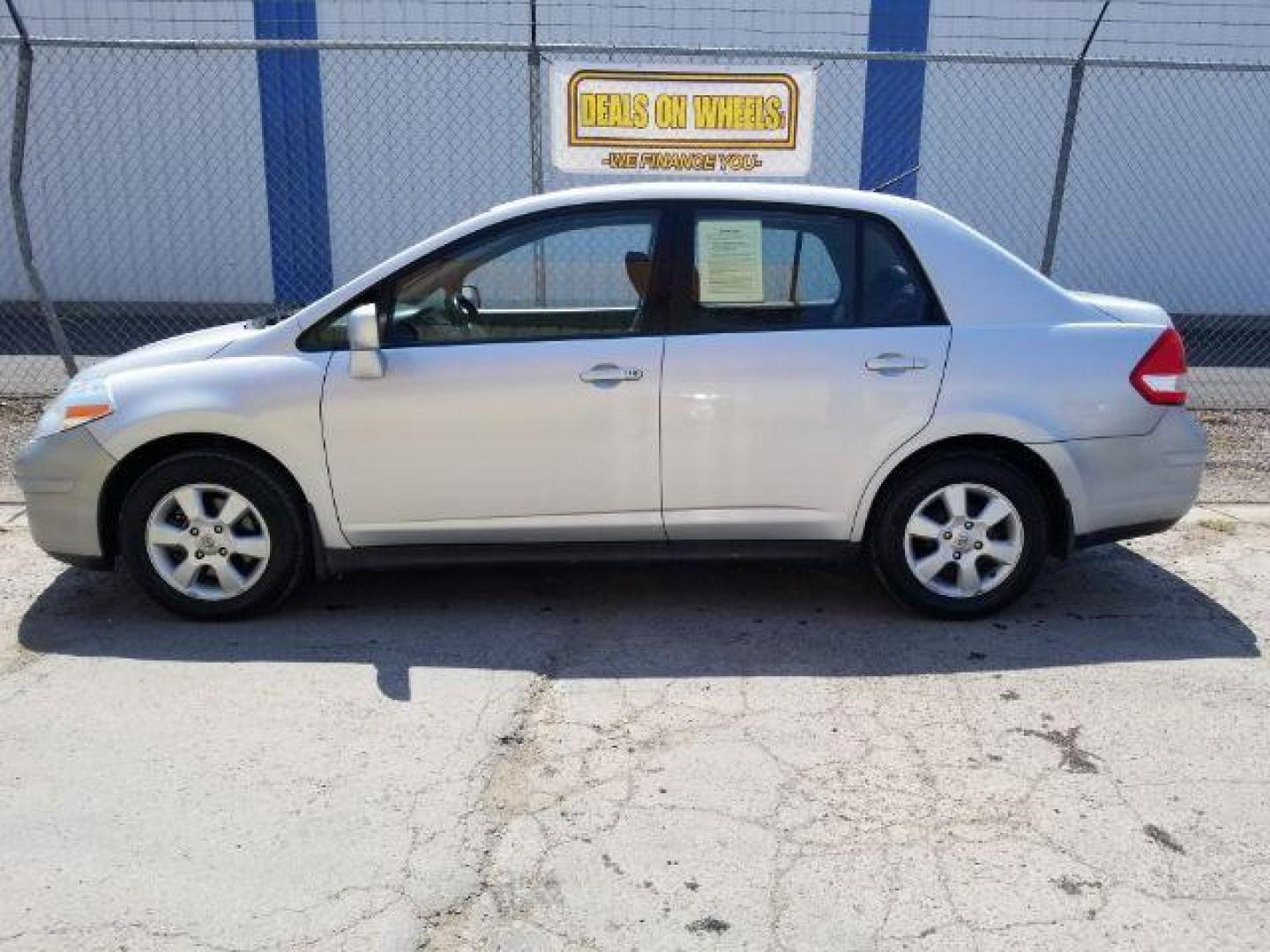 2010 Nissan Versa 1.8 S Sedan (3N1BC1AP9AL) with an 1.8L L4 DOHC 16V engine, located at 601 E. Idaho St., Kalispell, MT, 59901, 48.203983, -114.308662 - Photo#2