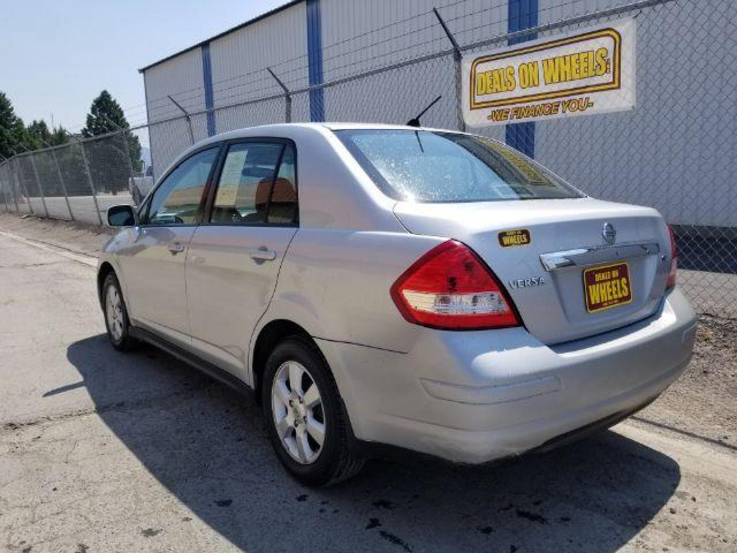 2010 Nissan Versa 1.8 S Sedan (3N1BC1AP9AL) with an 1.8L L4 DOHC 16V engine, located at 601 E. Idaho St., Kalispell, MT, 59901, 48.203983, -114.308662 - Photo#3